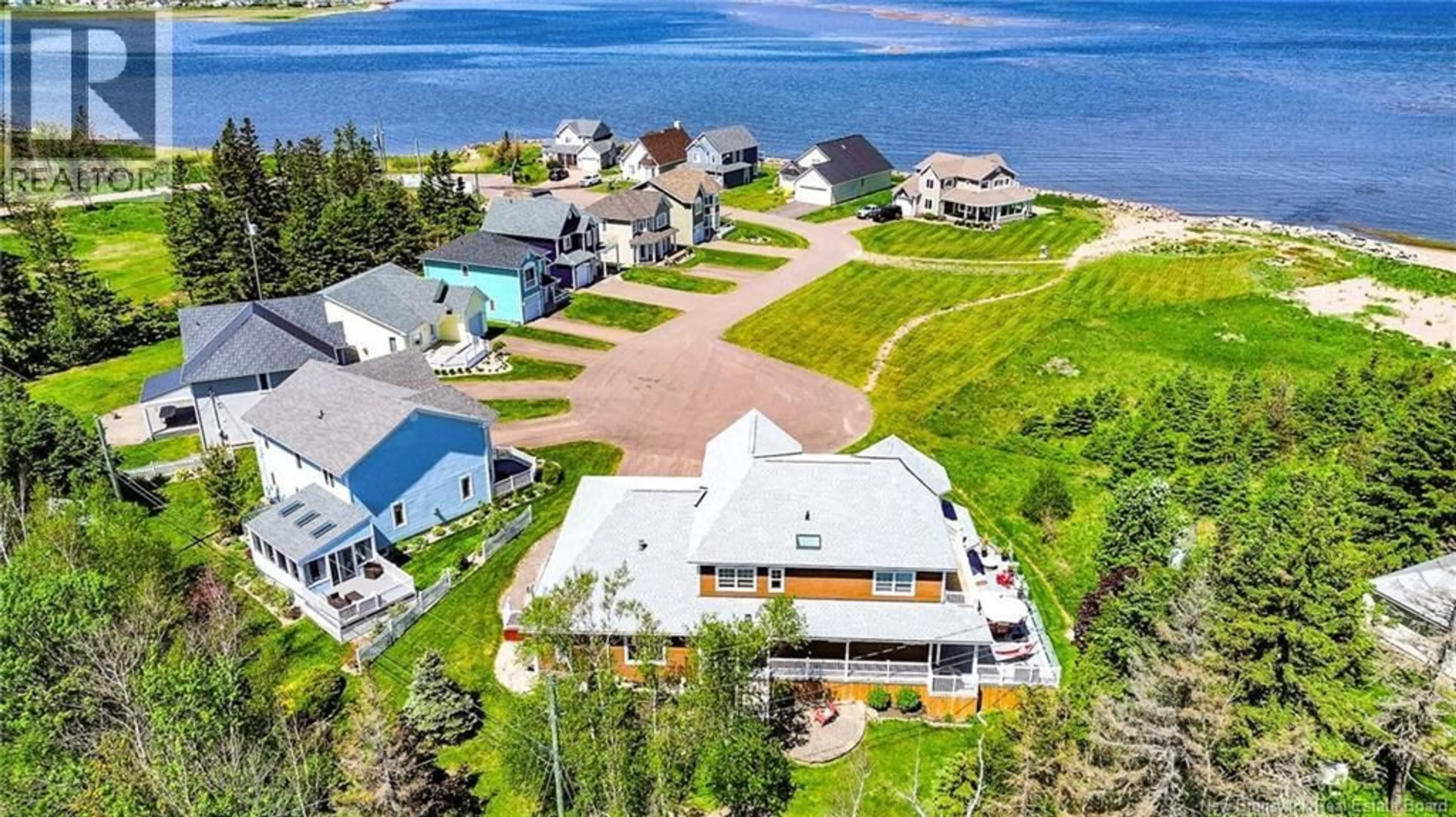 A pic from outside/outdoor area/front of a property/back of a property/a pic from drone, water/lake/river/ocean view for 114 - 90 DE LA BRECHE, Grand-Barachois New Brunswick E4P8Y8