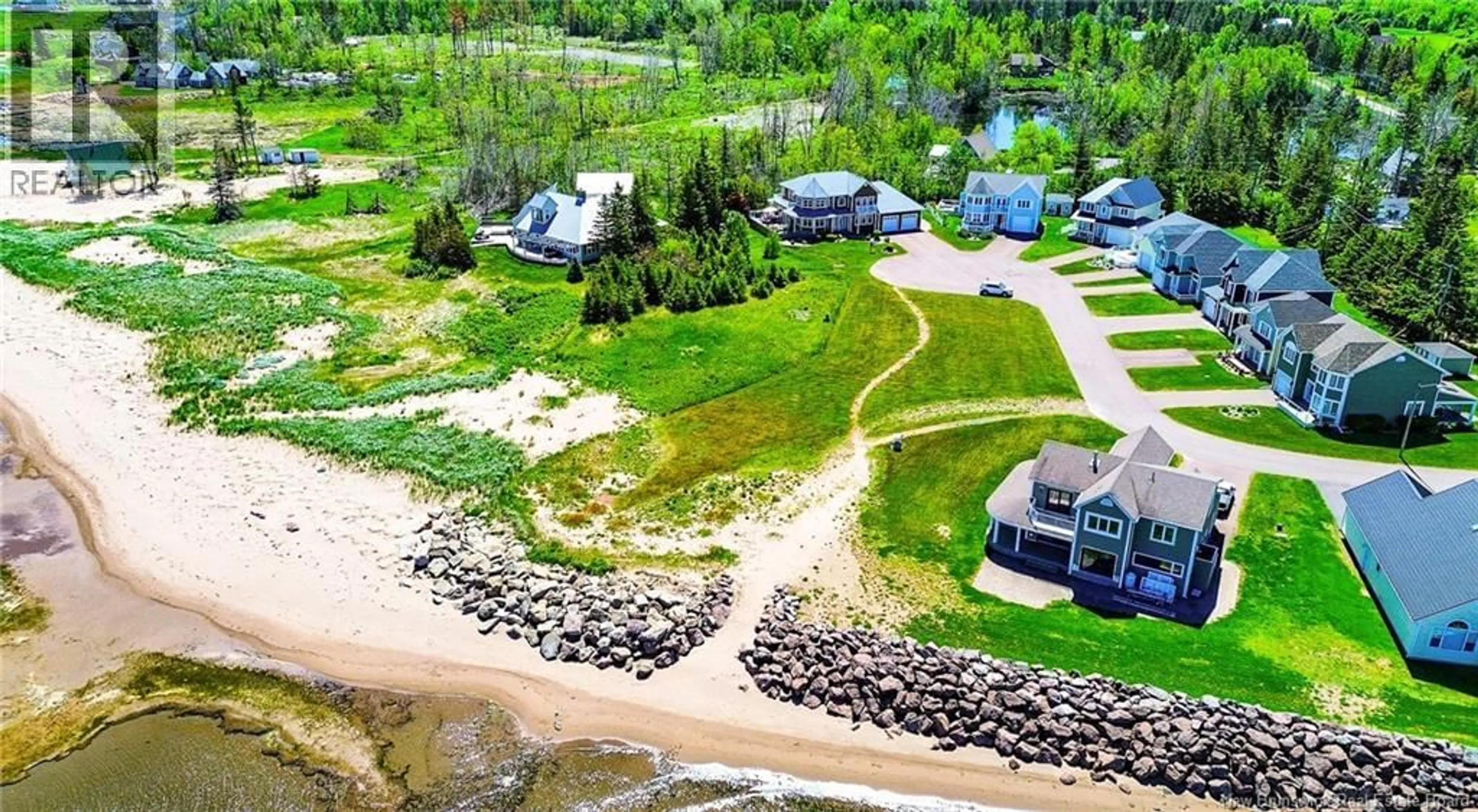 A pic from outside/outdoor area/front of a property/back of a property/a pic from drone, water/lake/river/ocean view for 114 - 90 DE LA BRECHE, Grand-Barachois New Brunswick E4P8Y8