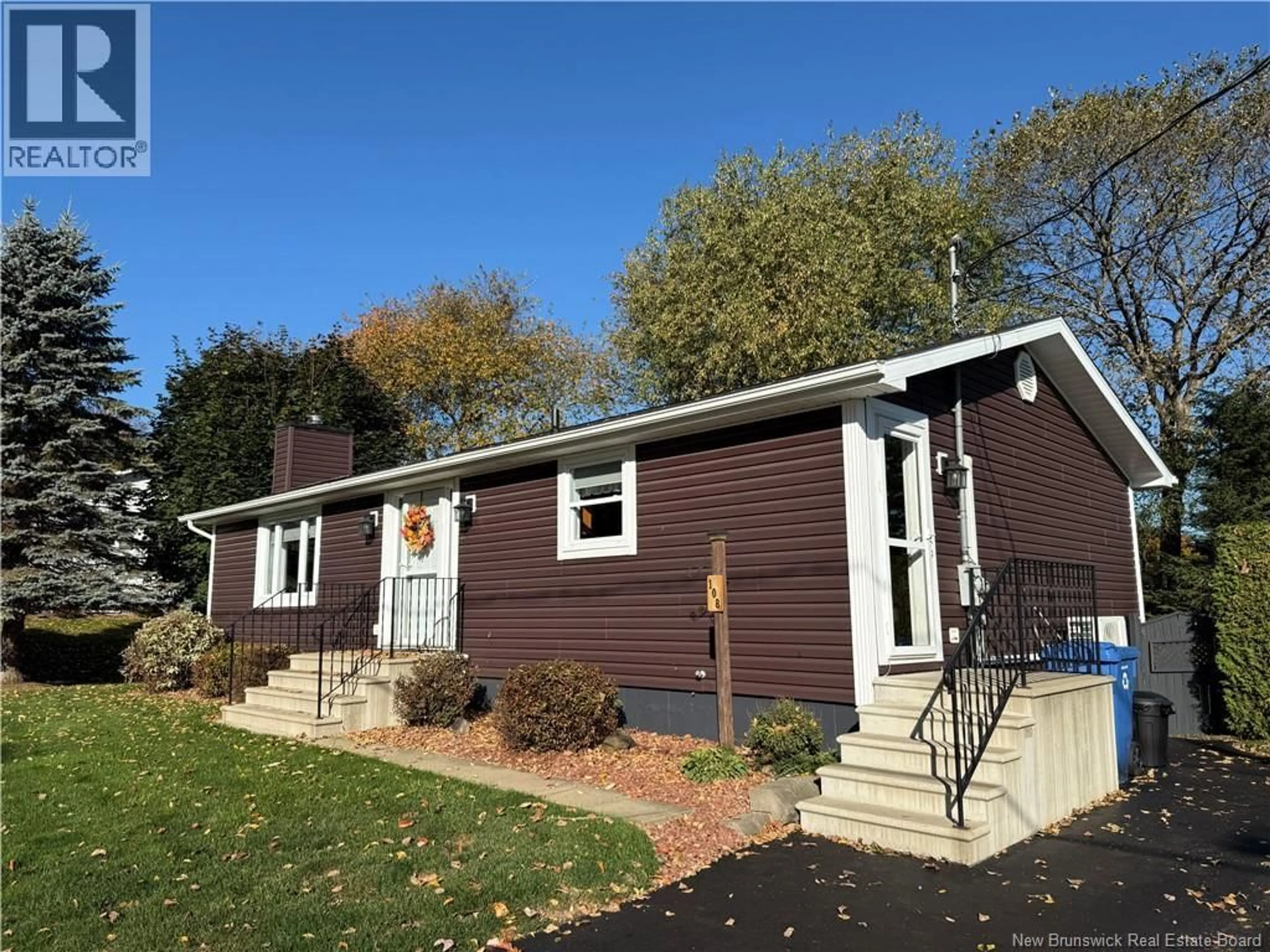 Home with vinyl exterior material, street for 108 FISHER AVENUE, Woodstock New Brunswick E7M1S2