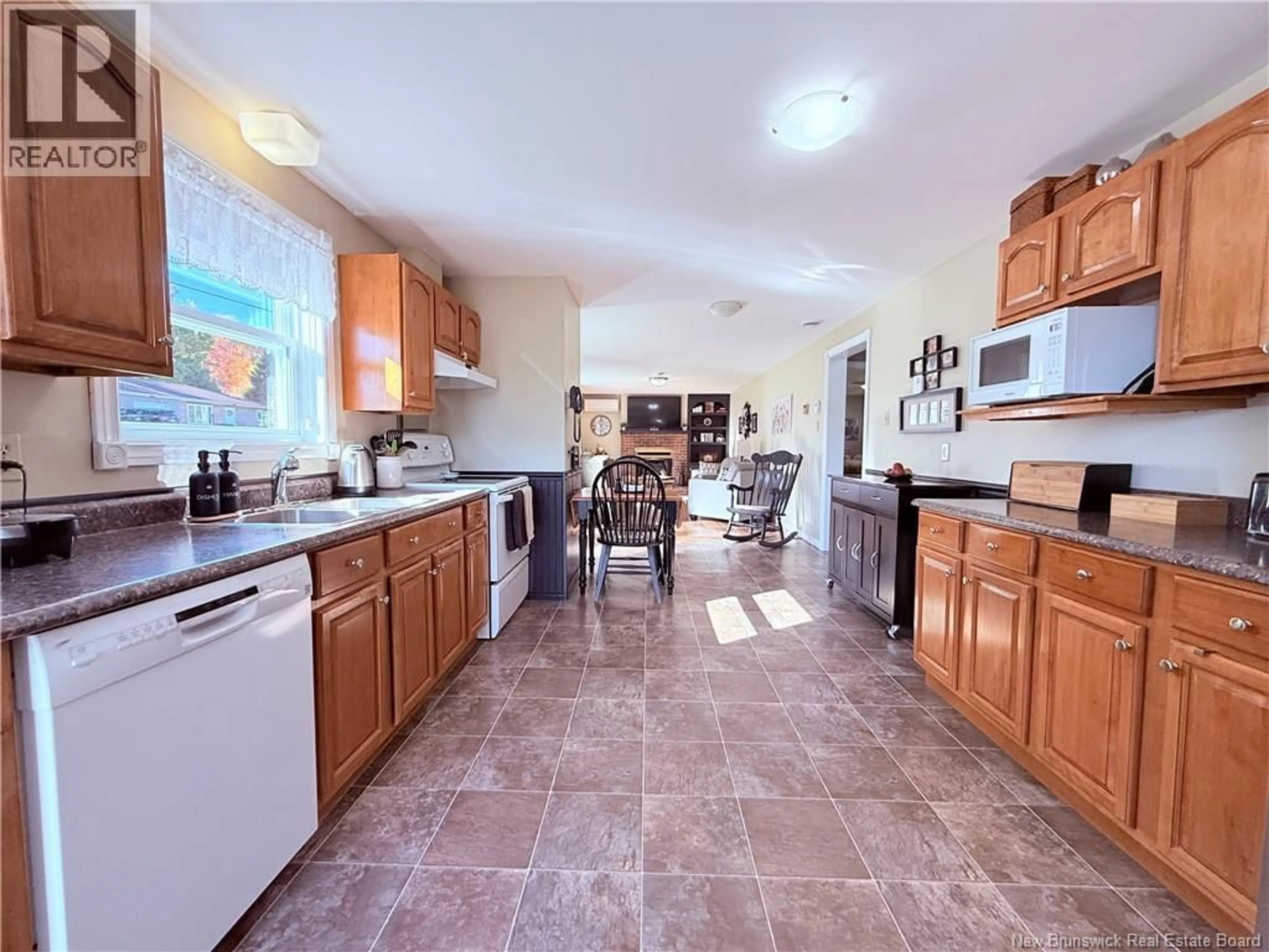 Open concept kitchen, ceramic/tile floor for 108 FISHER AVENUE, Woodstock New Brunswick E7M1S2