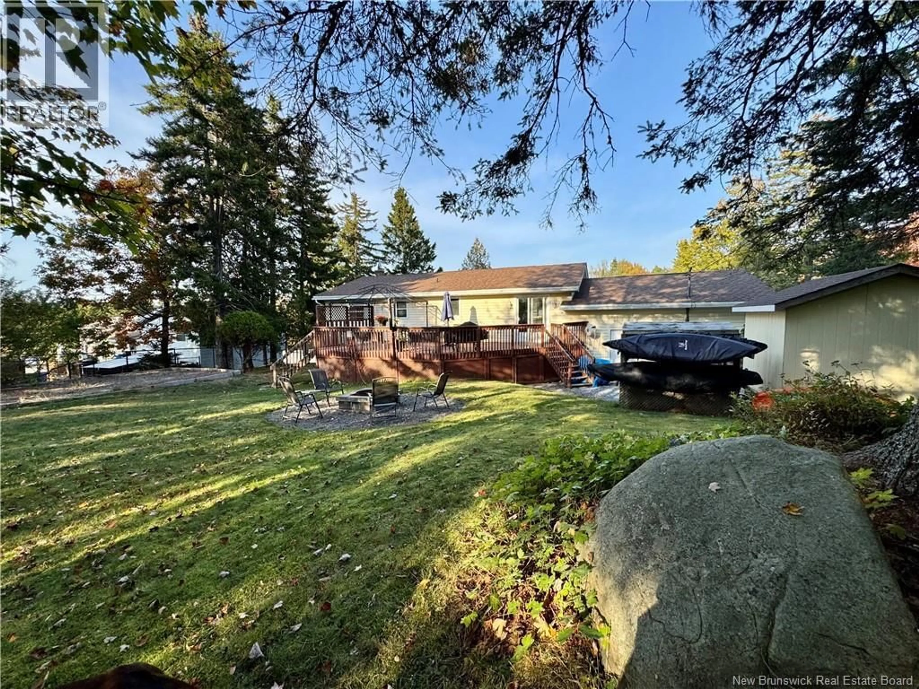 A pic from outside/outdoor area/front of a property/back of a property/a pic from drone, water/lake/river/ocean view for 4 COUNTRY CRESCENT, Quispamsis New Brunswick E2E1T1