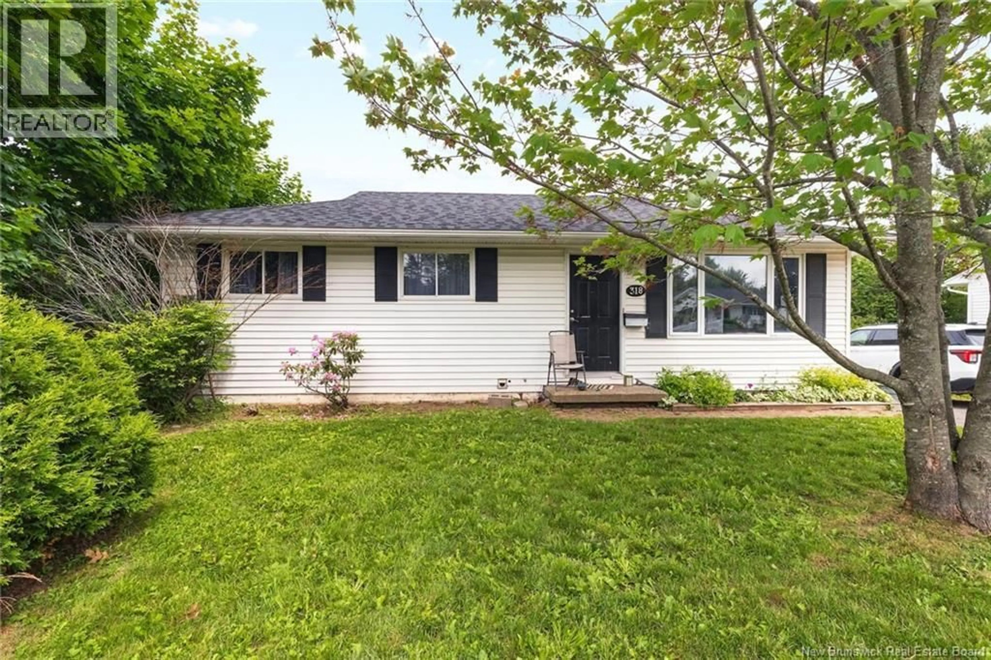 Home with vinyl exterior material, street for 318 CANTERBURY DRIVE, Fredericton New Brunswick E3B4L9