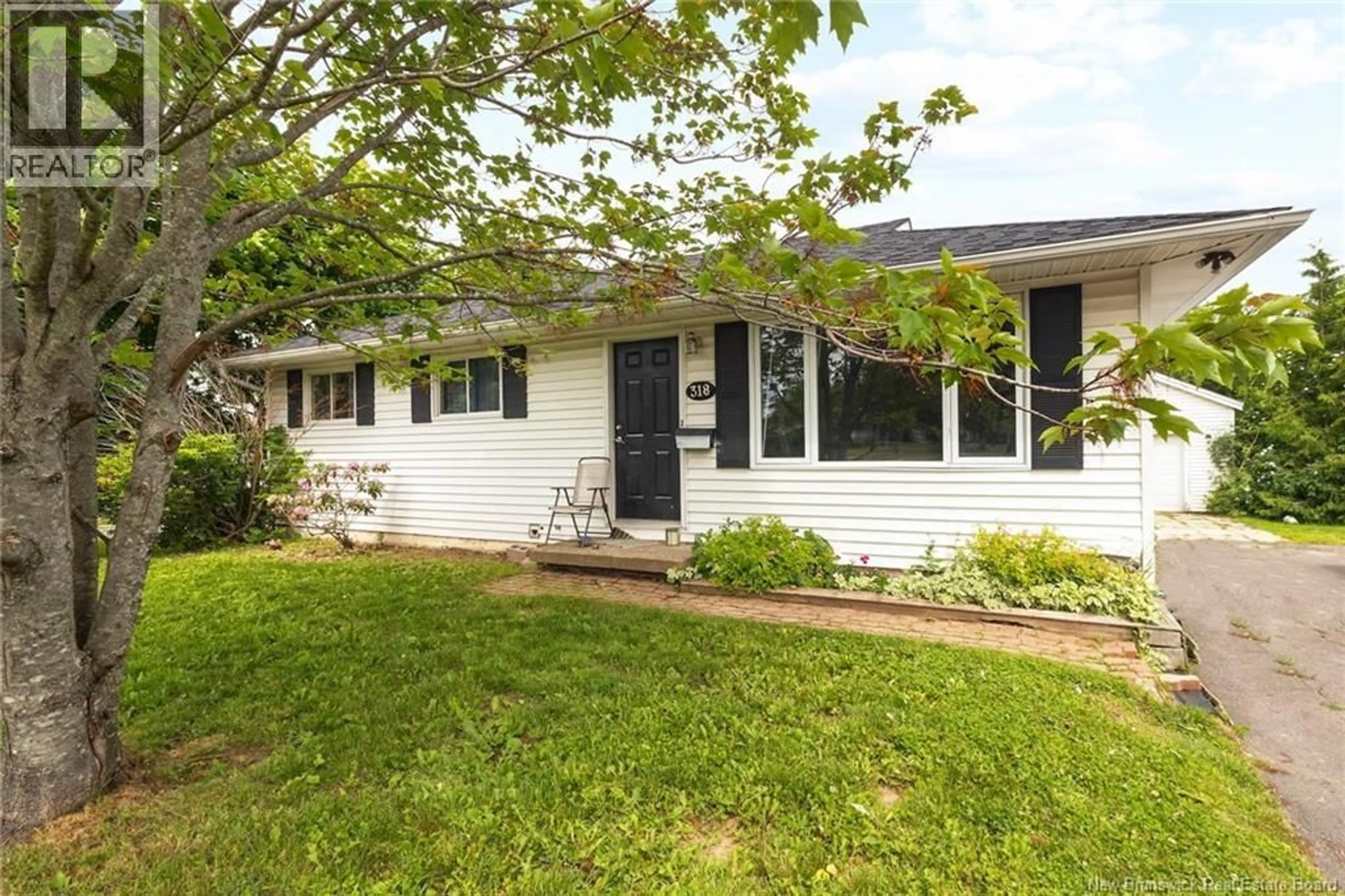 Home with vinyl exterior material, street for 318 CANTERBURY DRIVE, Fredericton New Brunswick E3B4L9