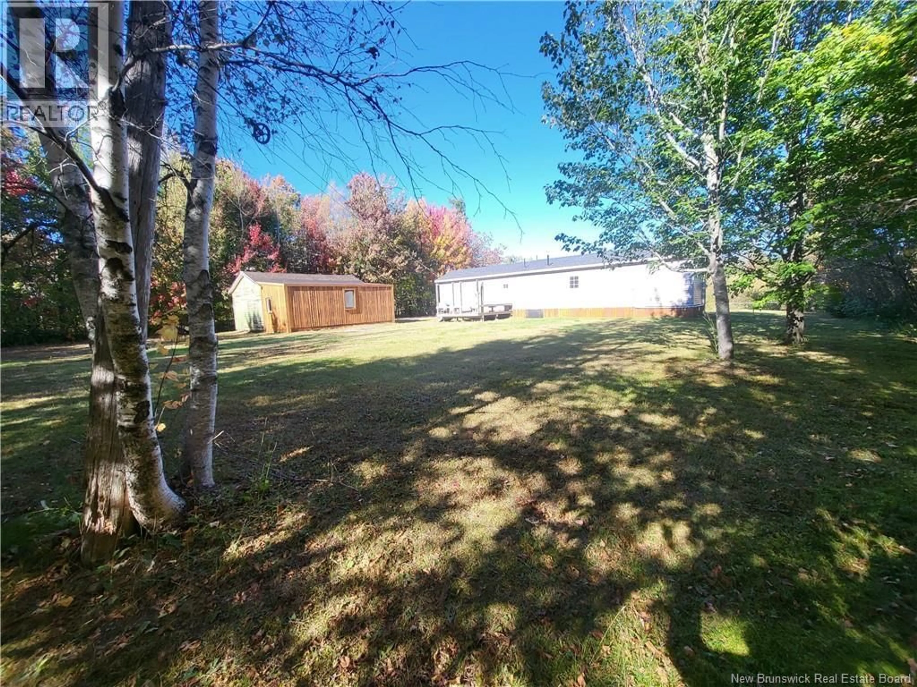 A pic from outside/outdoor area/front of a property/back of a property/a pic from drone, forest/trees view for 10274 134 ROUTE, Saint-Louis-De-Kent New Brunswick E4X1J5