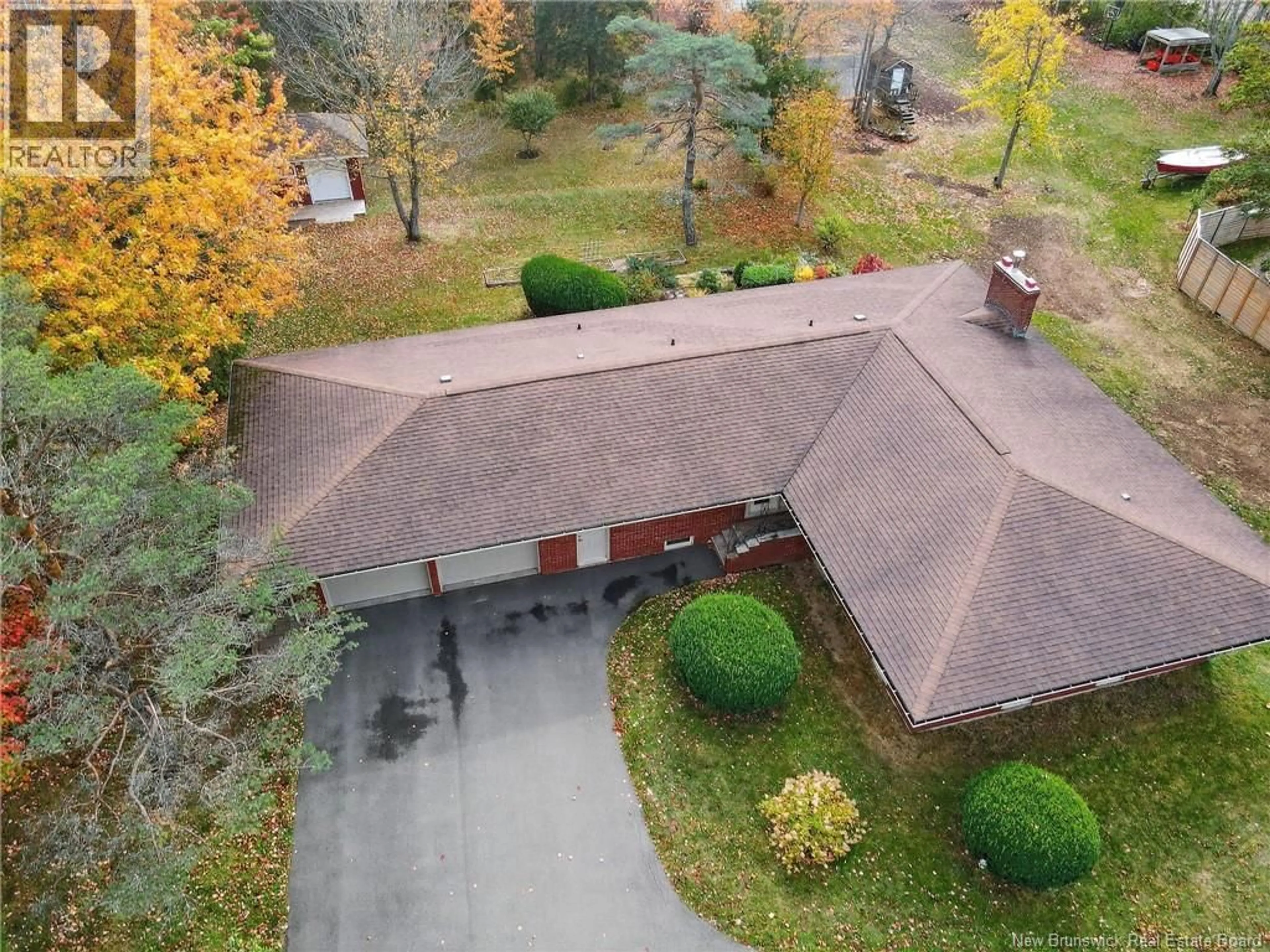 A pic from outside/outdoor area/front of a property/back of a property/a pic from drone, unknown for 610 SHEDIAC ROAD, Moncton New Brunswick E1A2T1