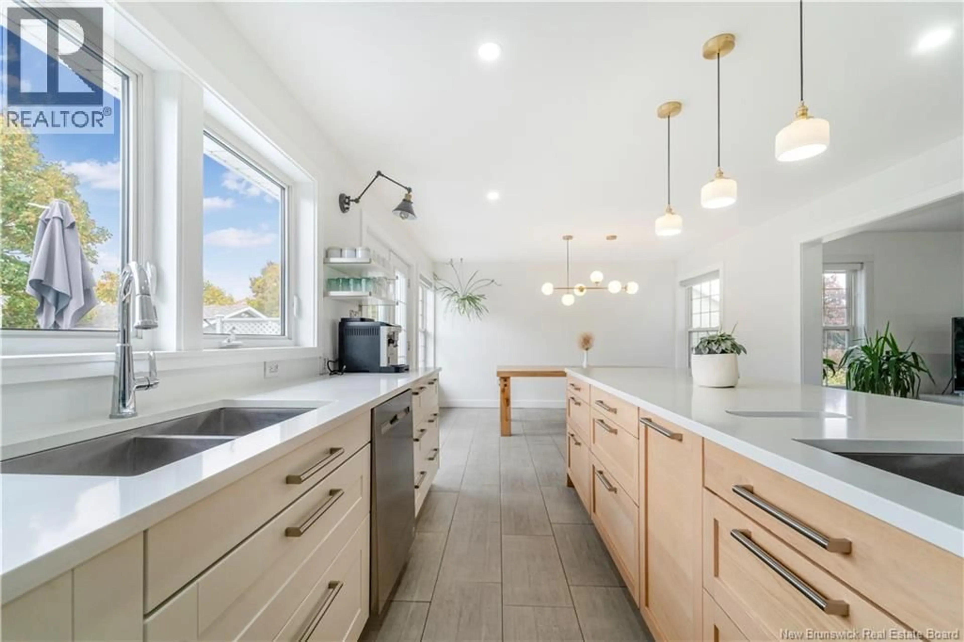Open concept kitchen, ceramic/tile floor for 256 RUE FOULEM STREET, Caraquet New Brunswick E1W1A4