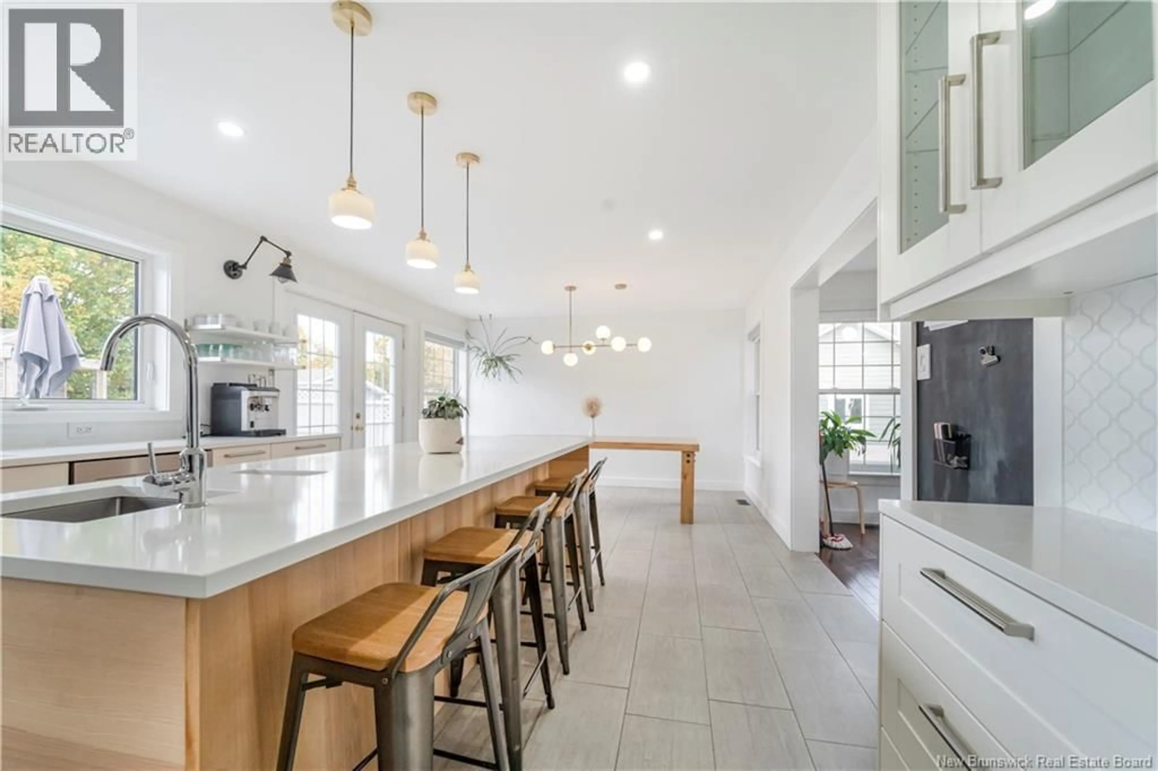 Open concept kitchen, ceramic/tile floor for 256 RUE FOULEM STREET, Caraquet New Brunswick E1W1A4