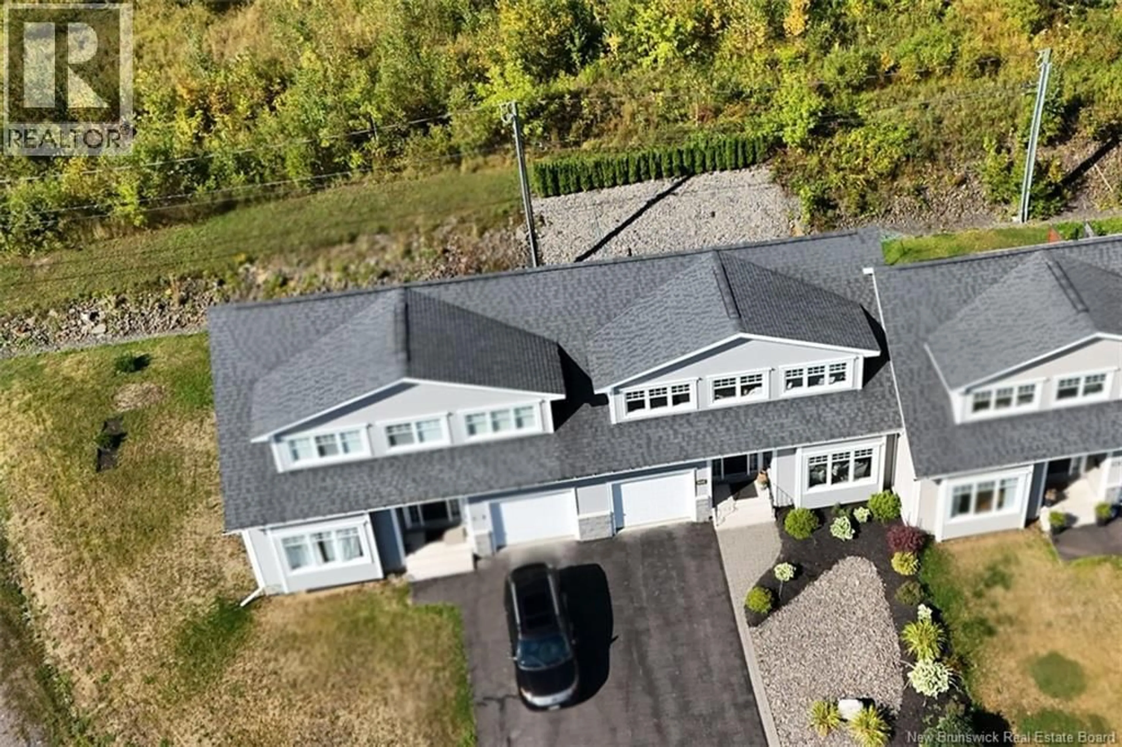 A pic from outside/outdoor area/front of a property/back of a property/a pic from drone, building for 304 DUNNS CROSSING ROAD, Fredericton New Brunswick E3B2A6