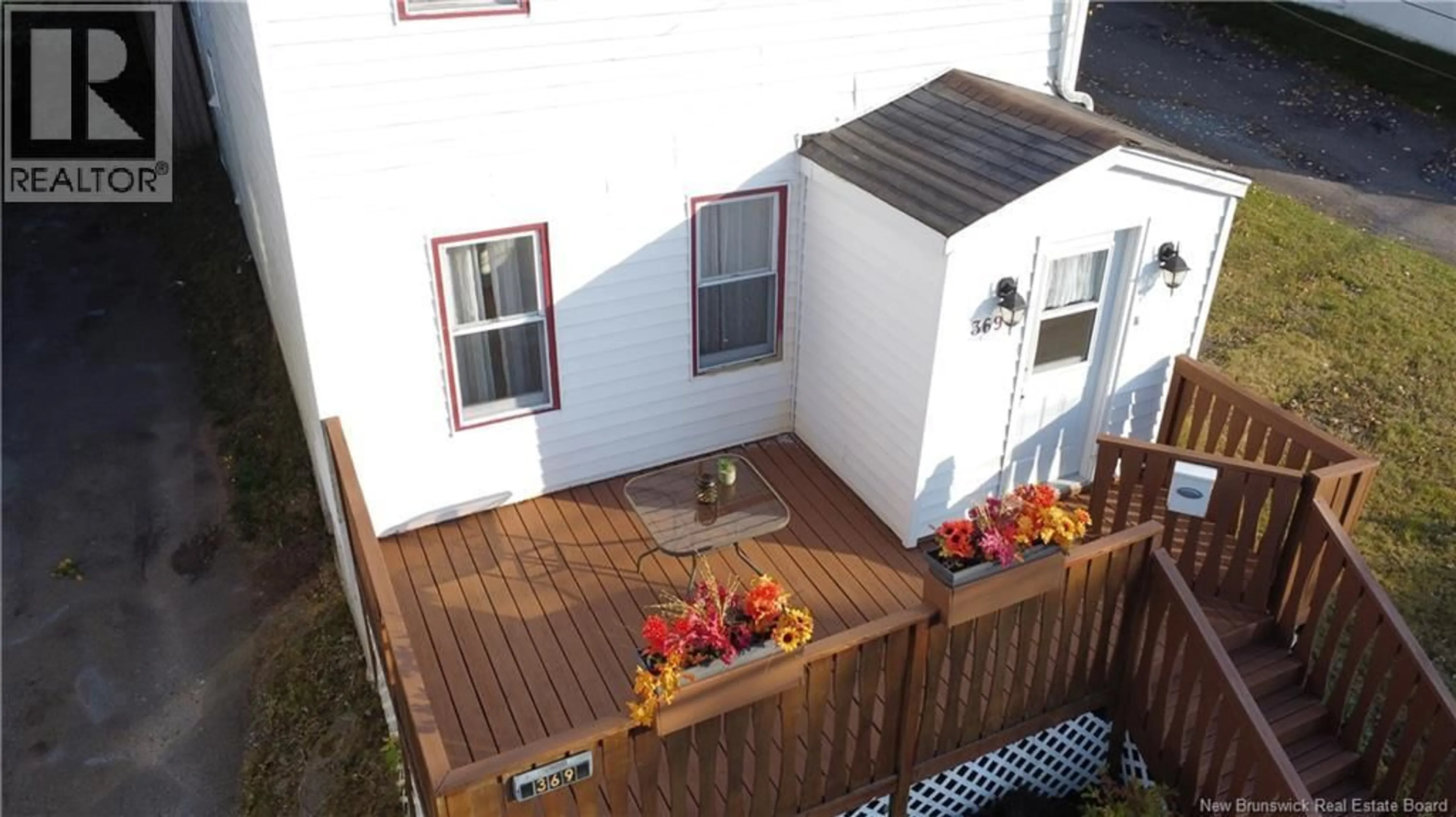 A pic from outside/outdoor area/front of a property/back of a property/a pic from drone, unknown for 369 DUKE STREET, Saint John New Brunswick E2M1V4
