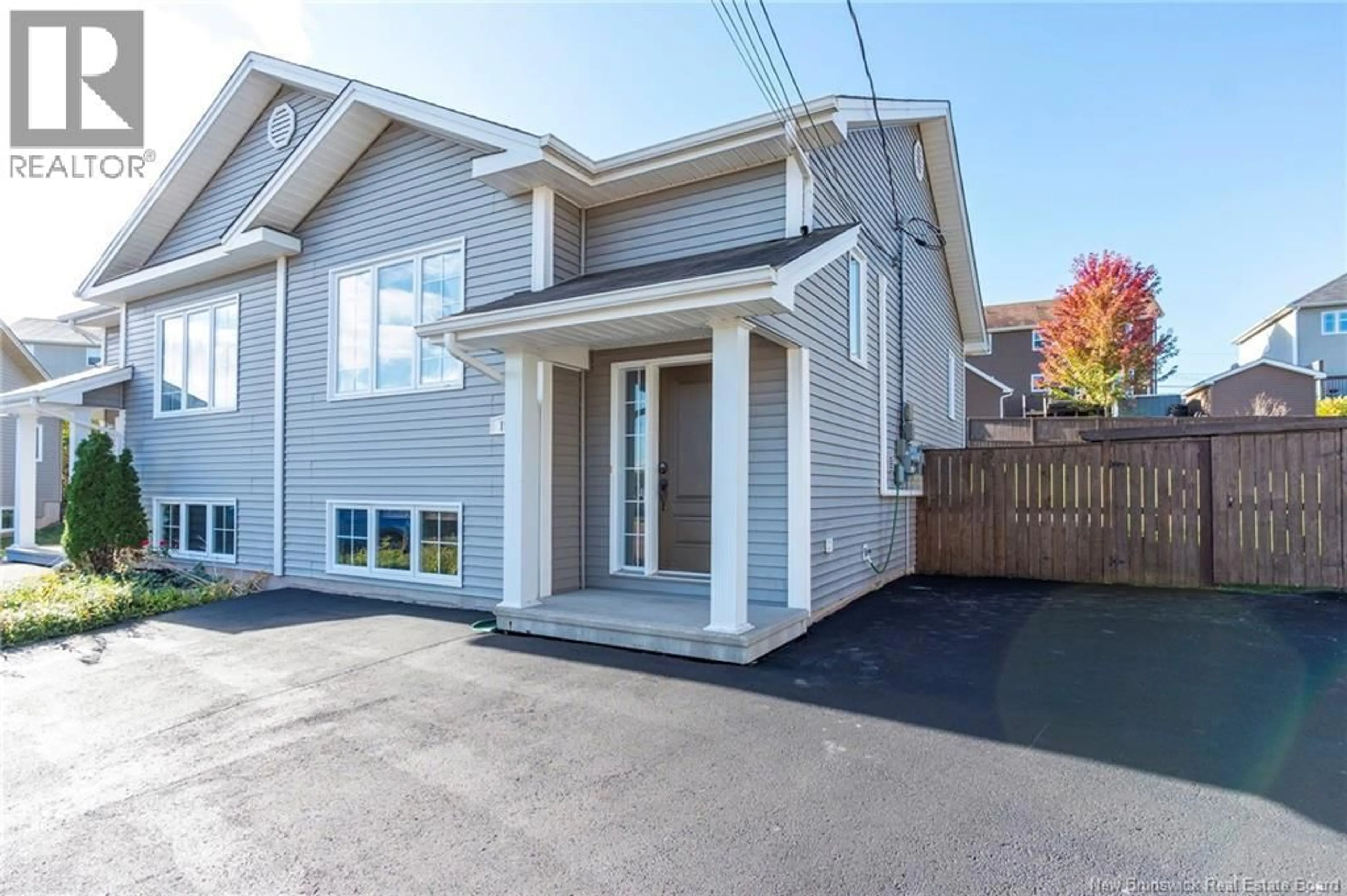 Home with vinyl exterior material, street for 190 HOULAHAN STREET, Dieppe New Brunswick E1A4X6