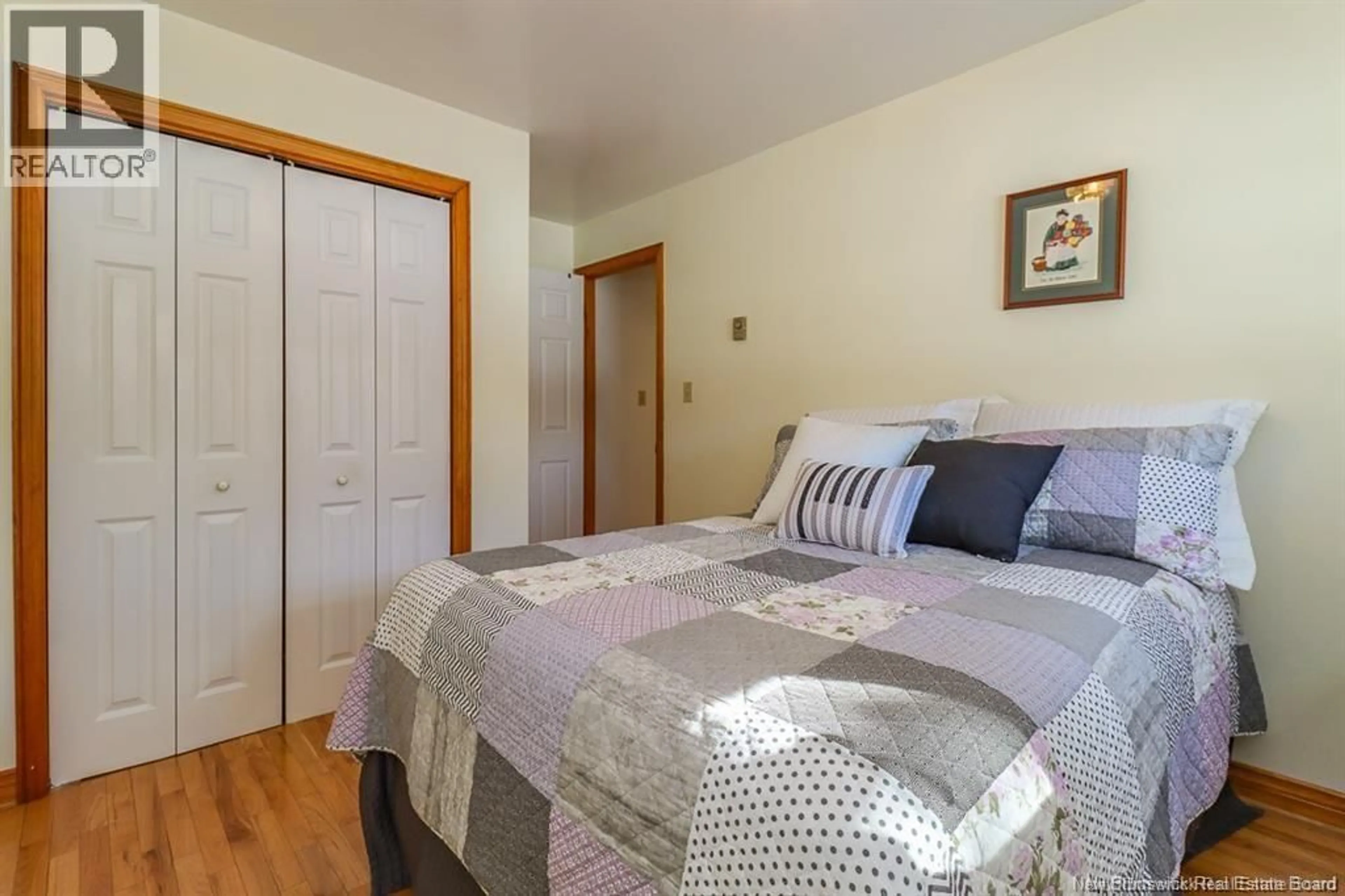 Bedroom with bed, wood/laminate floor for 27 MAXWELL DRIVE, Sussex New Brunswick E4E2E1