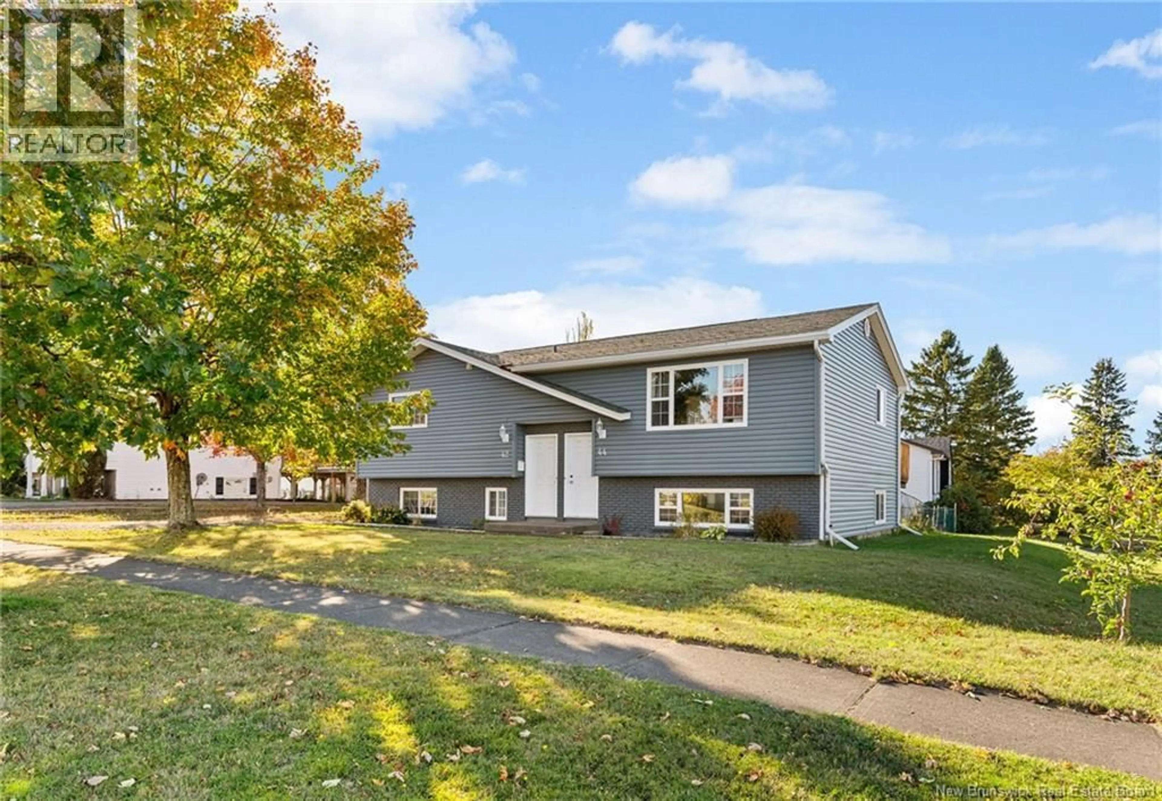 Home with vinyl exterior material, street for 42-44 MEADOWDALE, Moncton New Brunswick E1G1N5