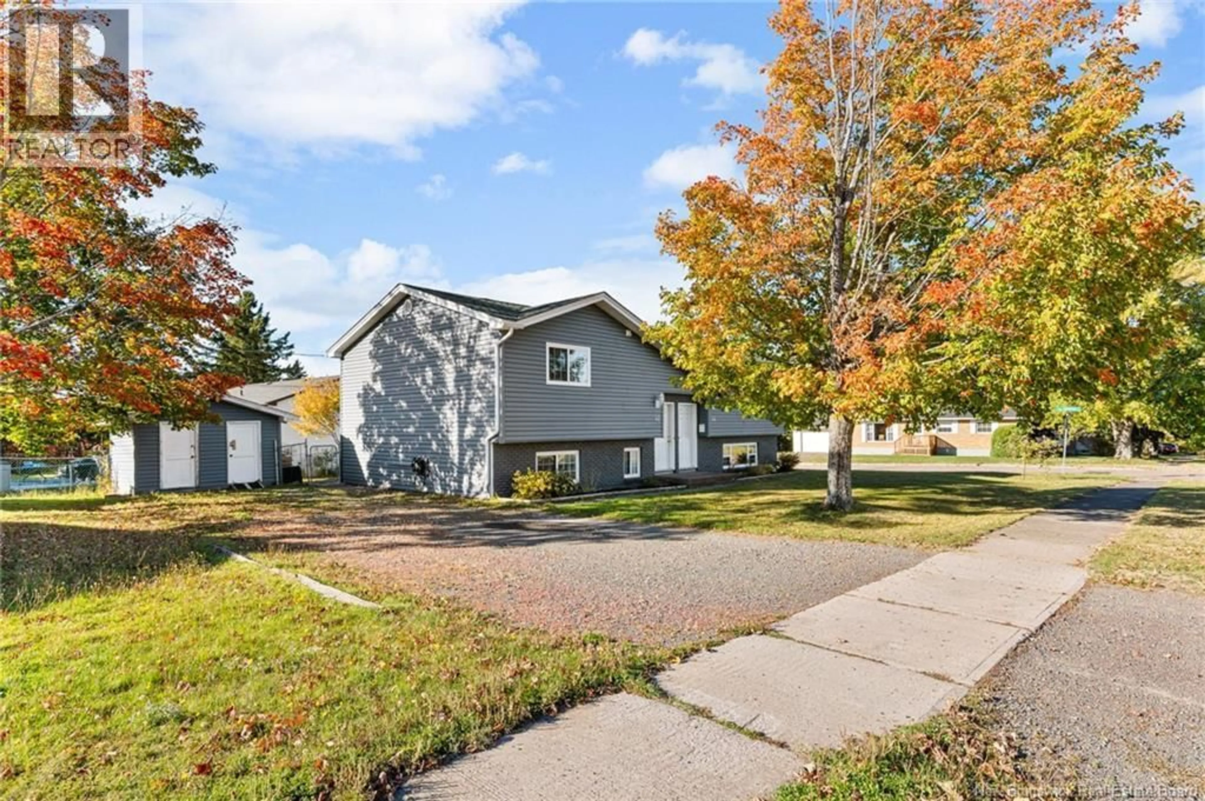 Home with vinyl exterior material, street for 42-44 MEADOWDALE, Moncton New Brunswick E1G1N5