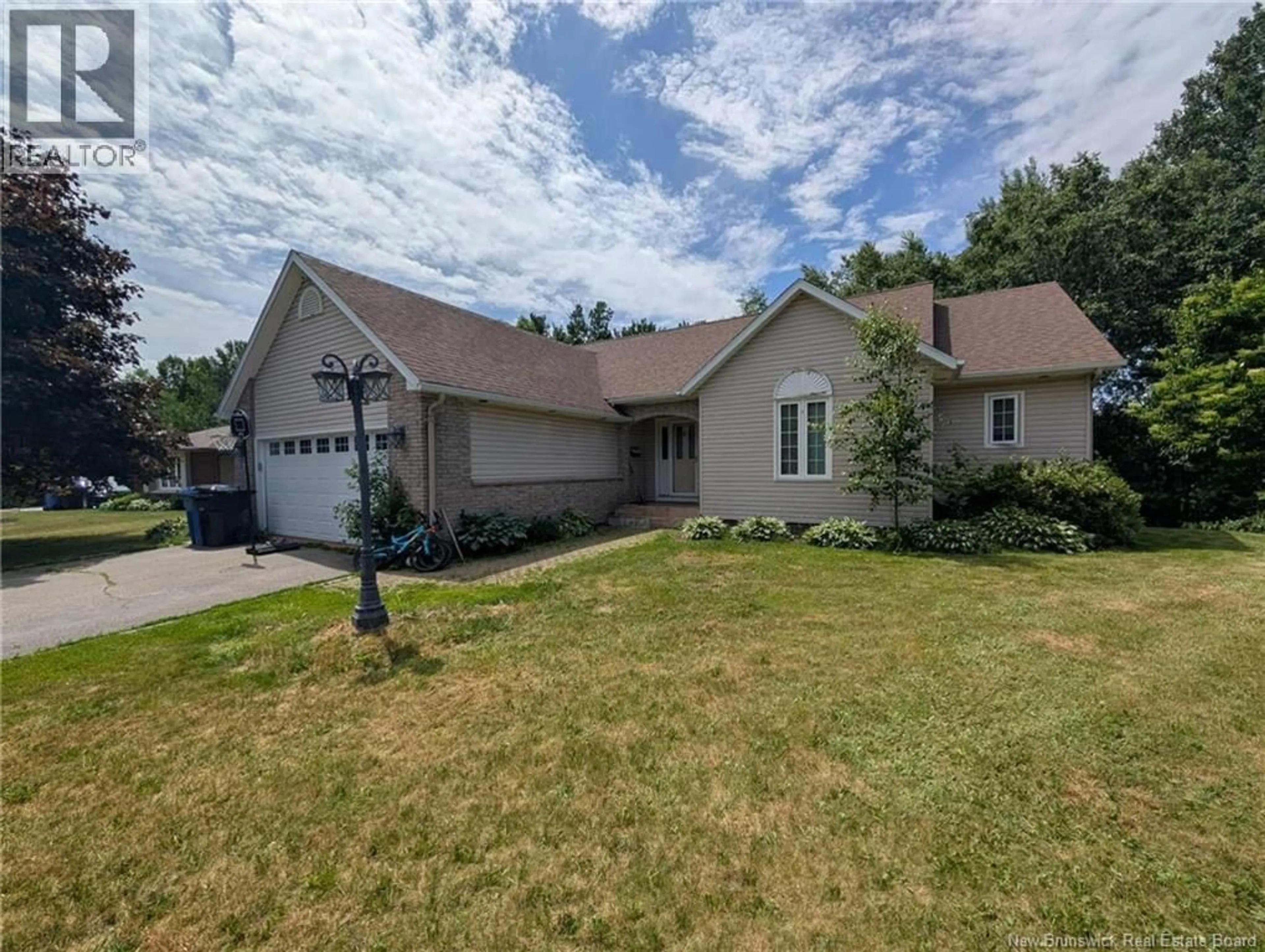 Home with vinyl exterior material, street for 1125 BIRCHWOOD DRIVE, Bathurst New Brunswick E2A4W8