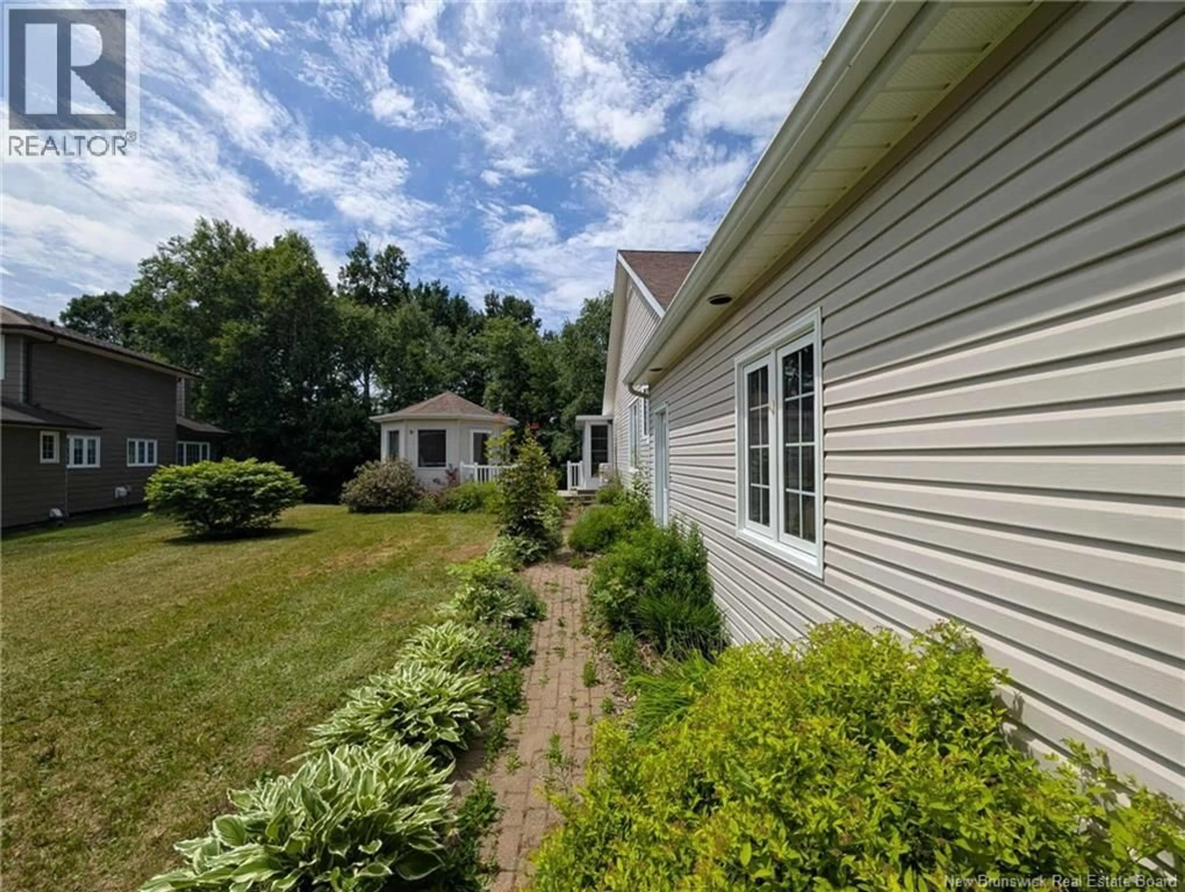 A pic from outside/outdoor area/front of a property/back of a property/a pic from drone, unknown for 1125 BIRCHWOOD DRIVE, Bathurst New Brunswick E2A4W8