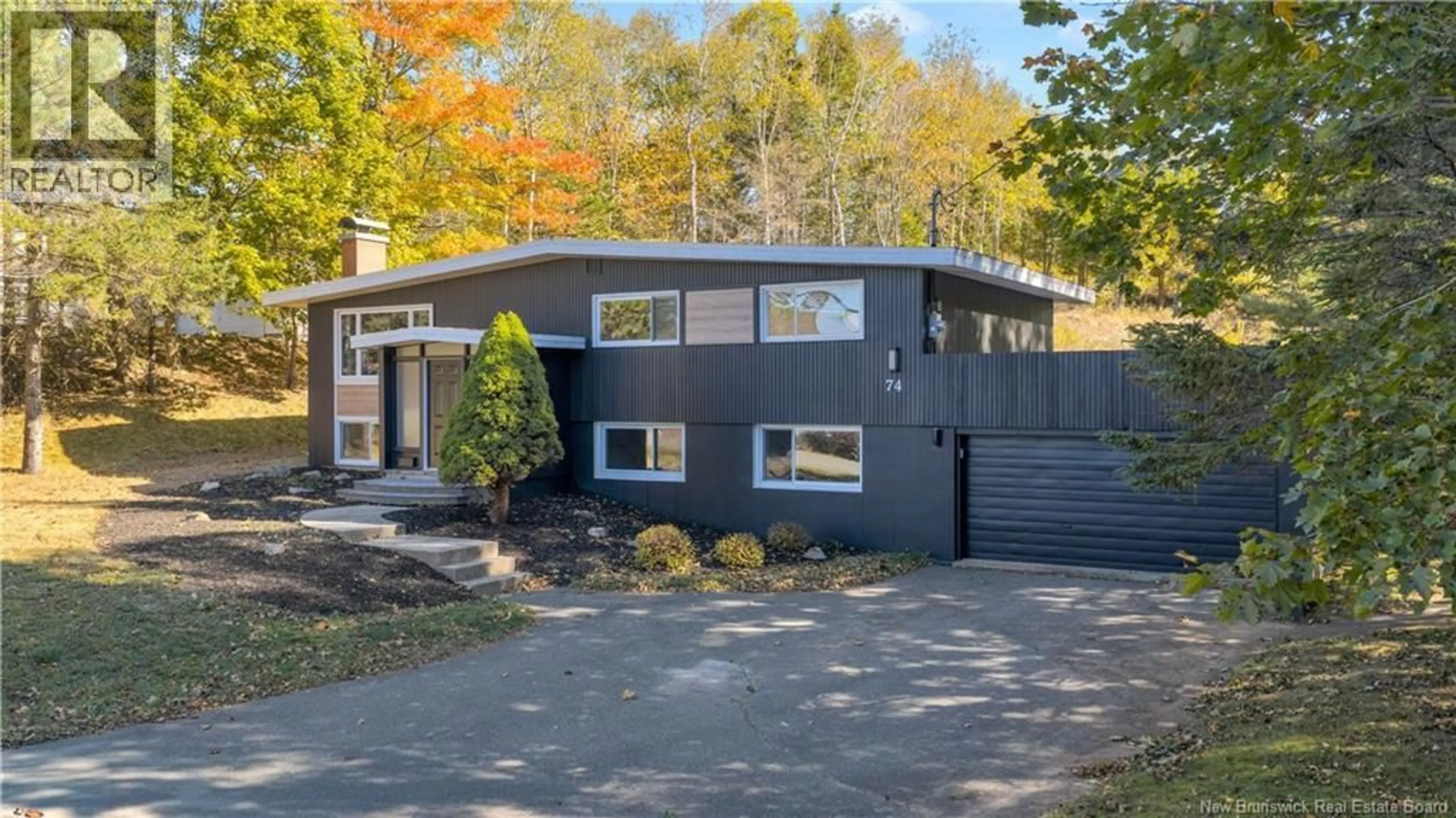 Home with vinyl exterior material, street for 74 ELIZABETH PARKWAY, Rothesay New Brunswick E2H1E9