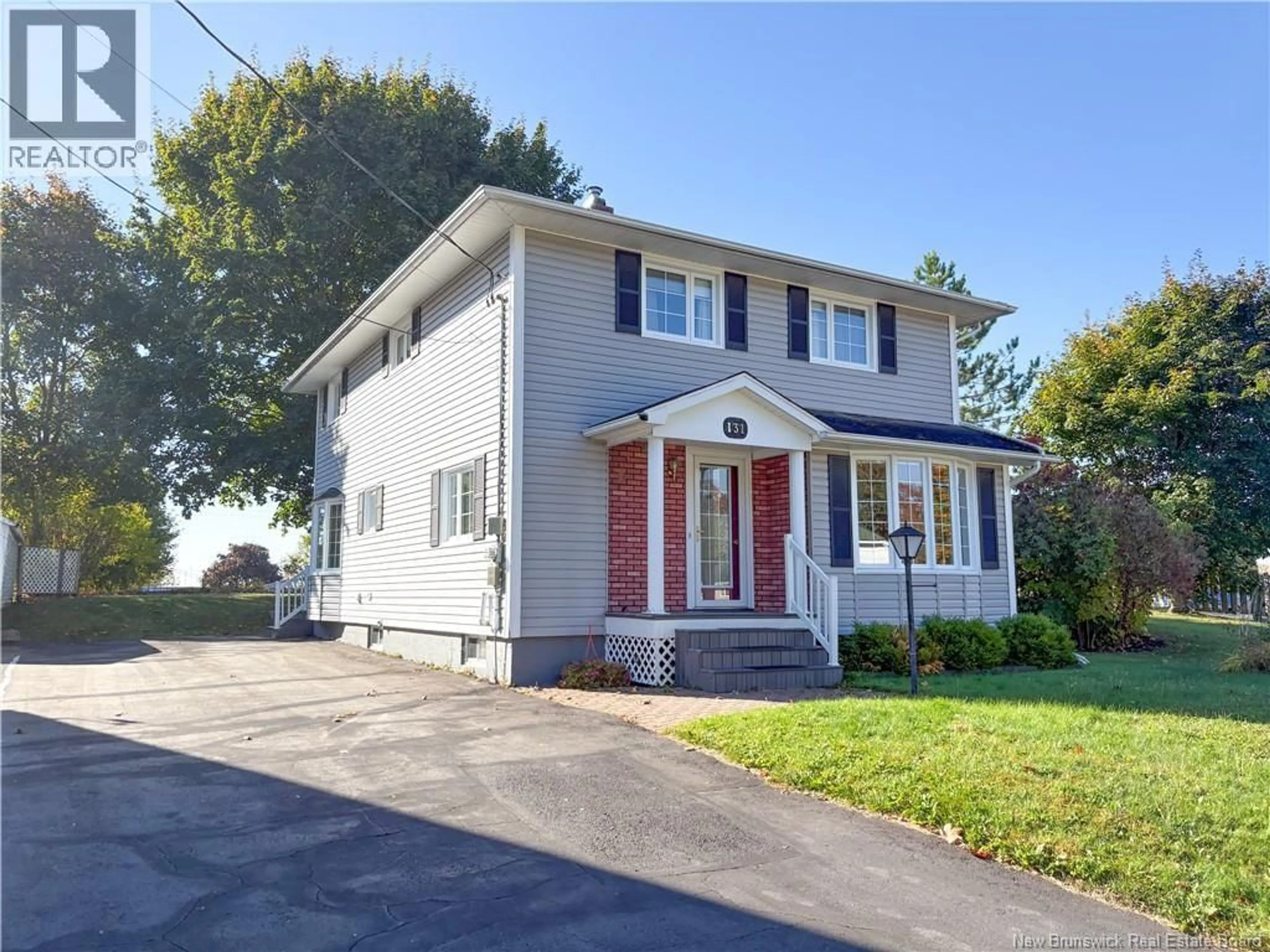 Home with vinyl exterior material, street for 131 CAMBRIDGE STREET, Woodstock New Brunswick E7M1E1