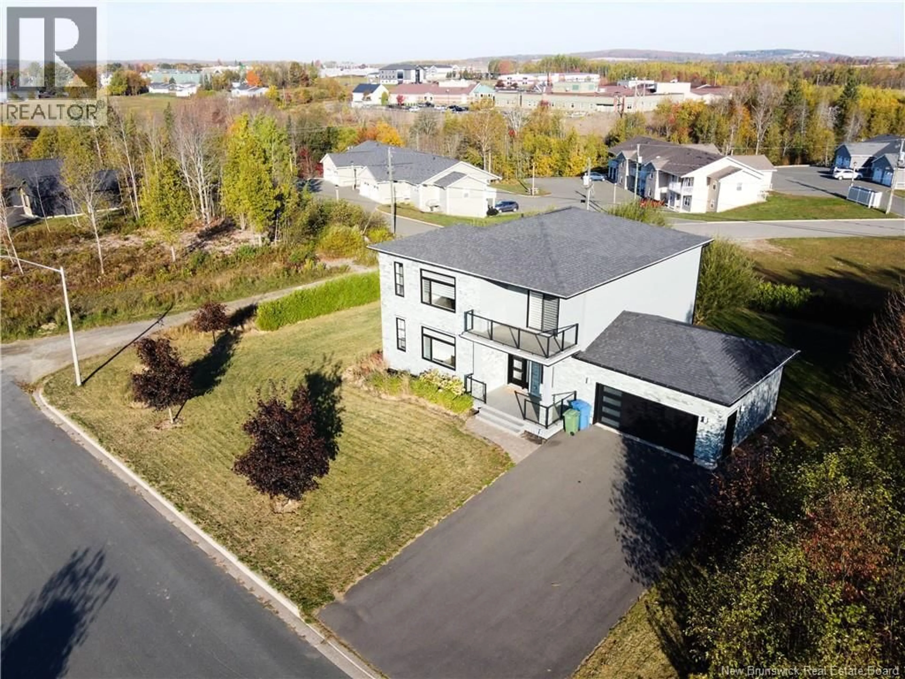 A pic from outside/outdoor area/front of a property/back of a property/a pic from drone, unknown for 44 BICENTENNIAL DRIVE, Woodstock New Brunswick E7M6A7