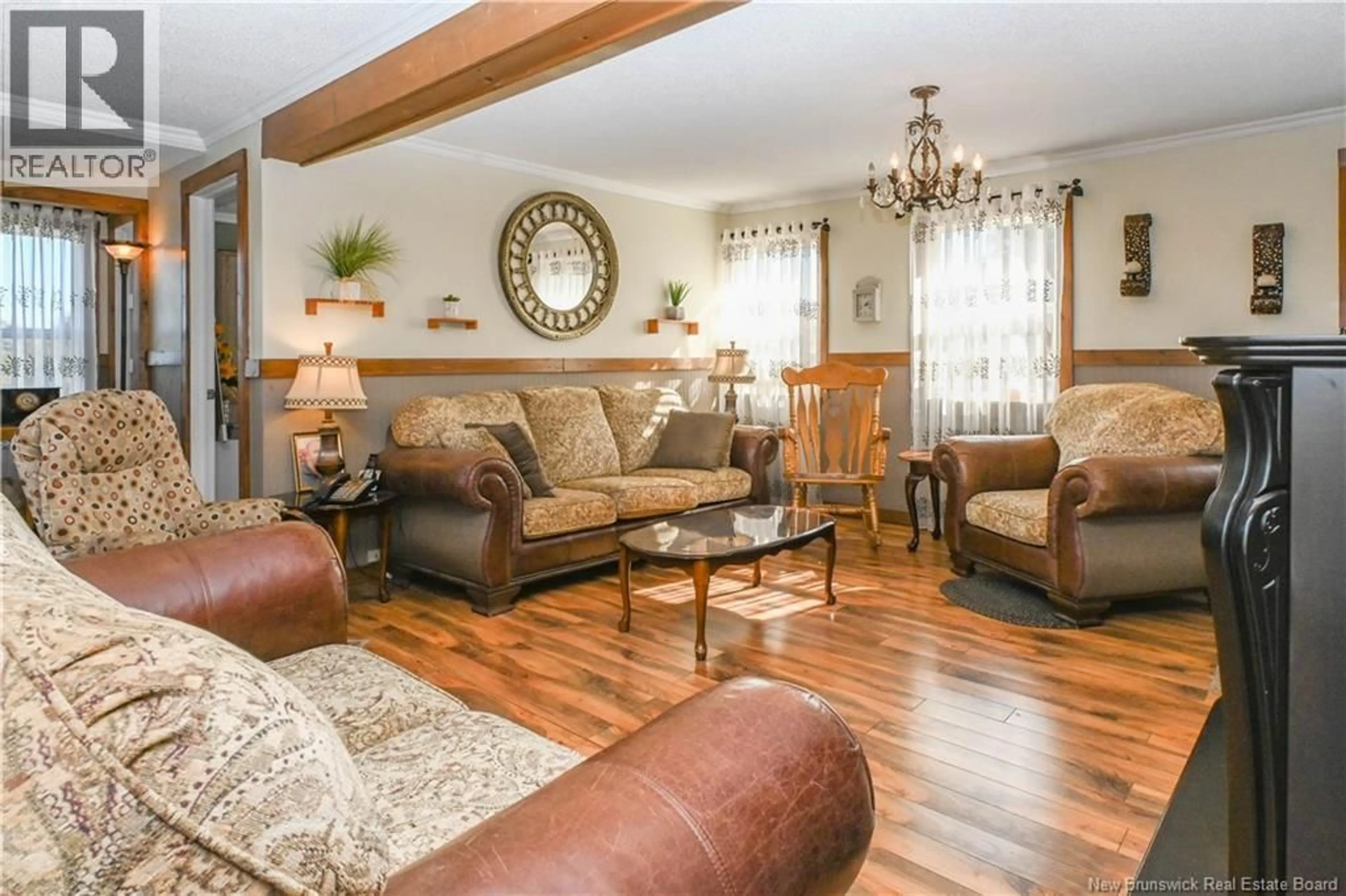 Living room with furniture, wood/laminate floor for 1434 355 ROUTE, Sainte-Rose New Brunswick E1X2X2
