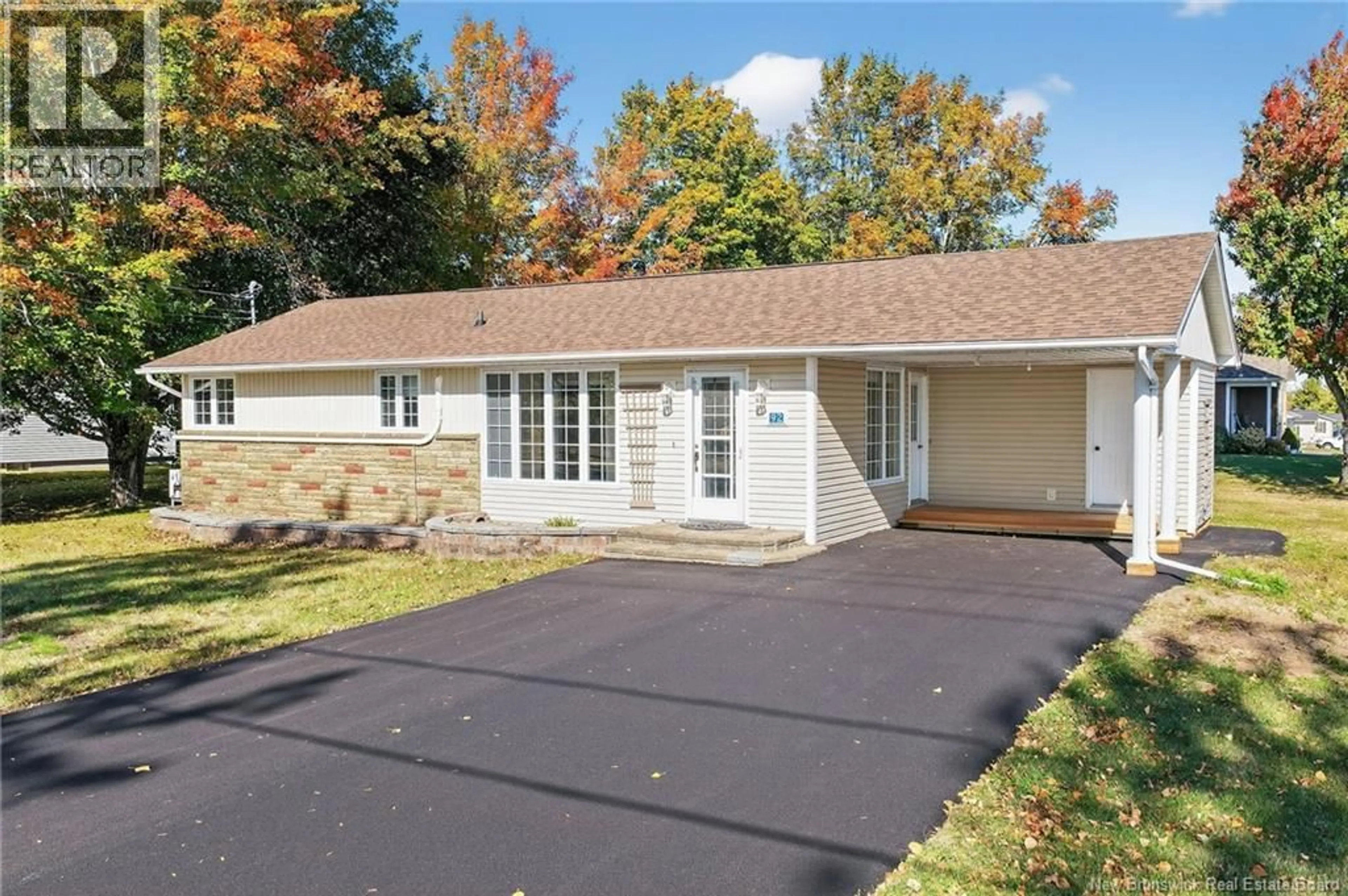 Home with vinyl exterior material, street for 92 CH DU COUVENT, Bouctouche New Brunswick E4S3B9