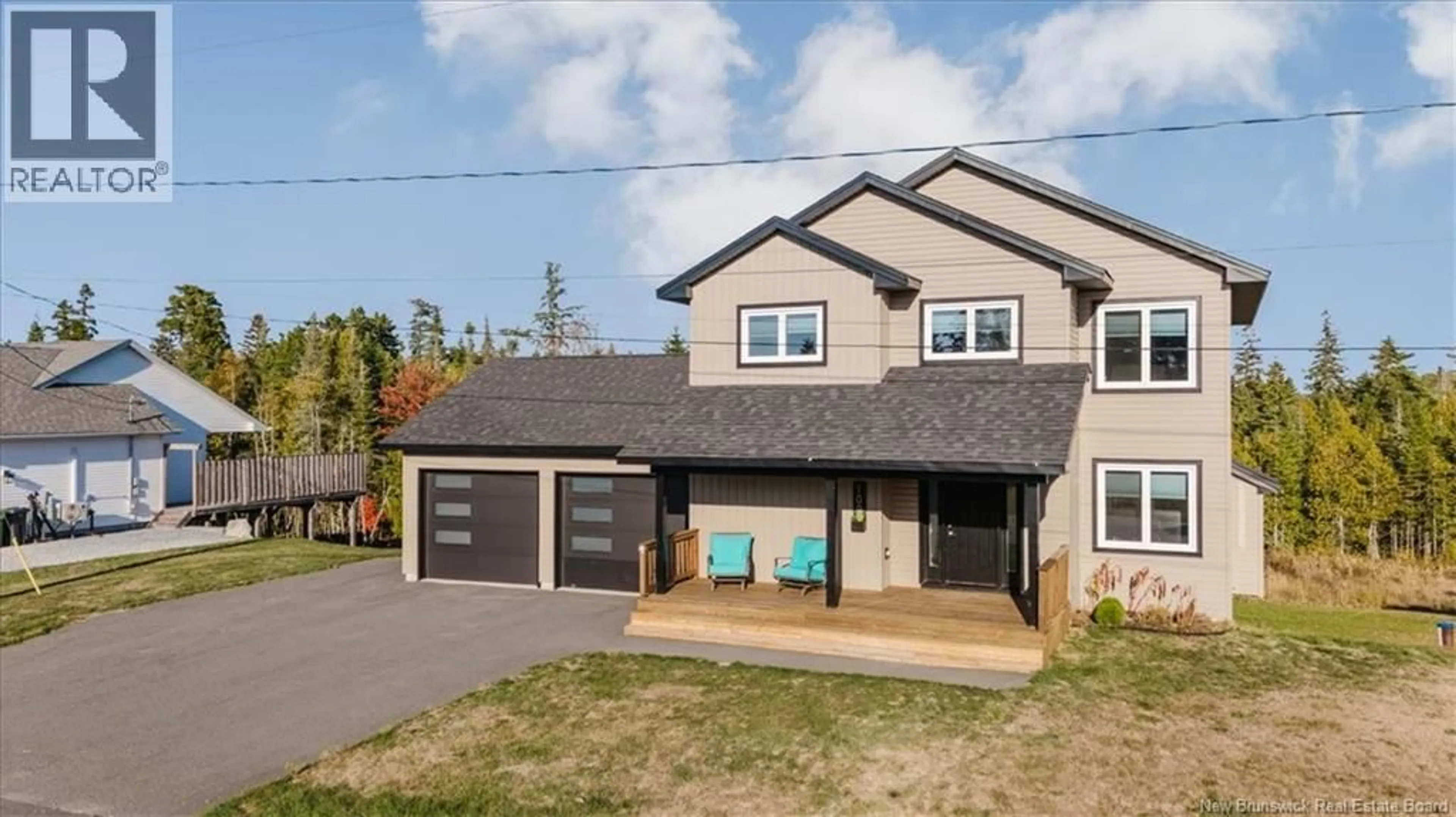 Home with vinyl exterior material, street for 100 NIGHTINGALE LANE, Quispamsis New Brunswick E2E0V8