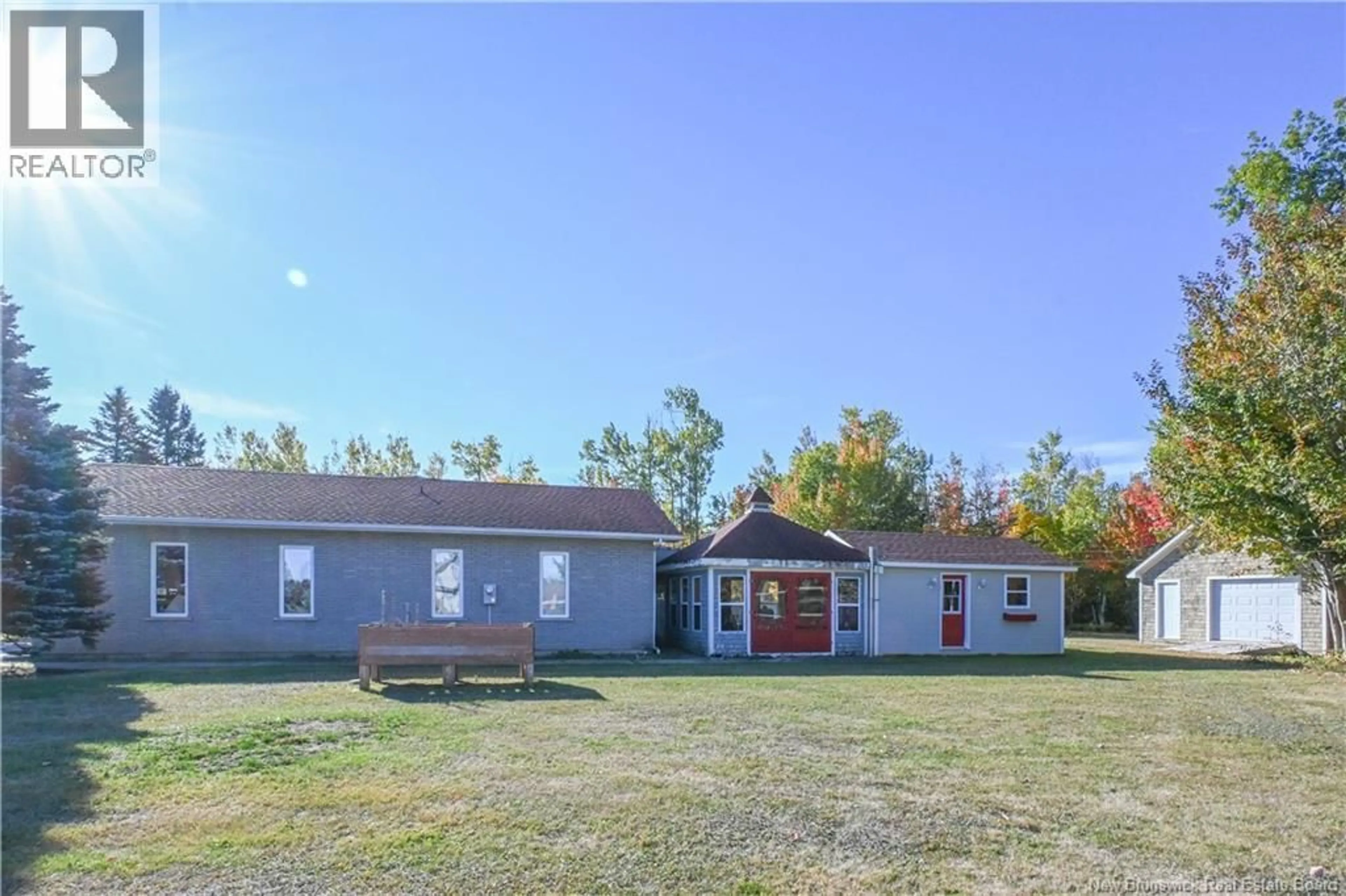 A pic from outside/outdoor area/front of a property/back of a property/a pic from drone, unknown for 118 RUE DU PORTAGE, Caraquet New Brunswick E1W1A8