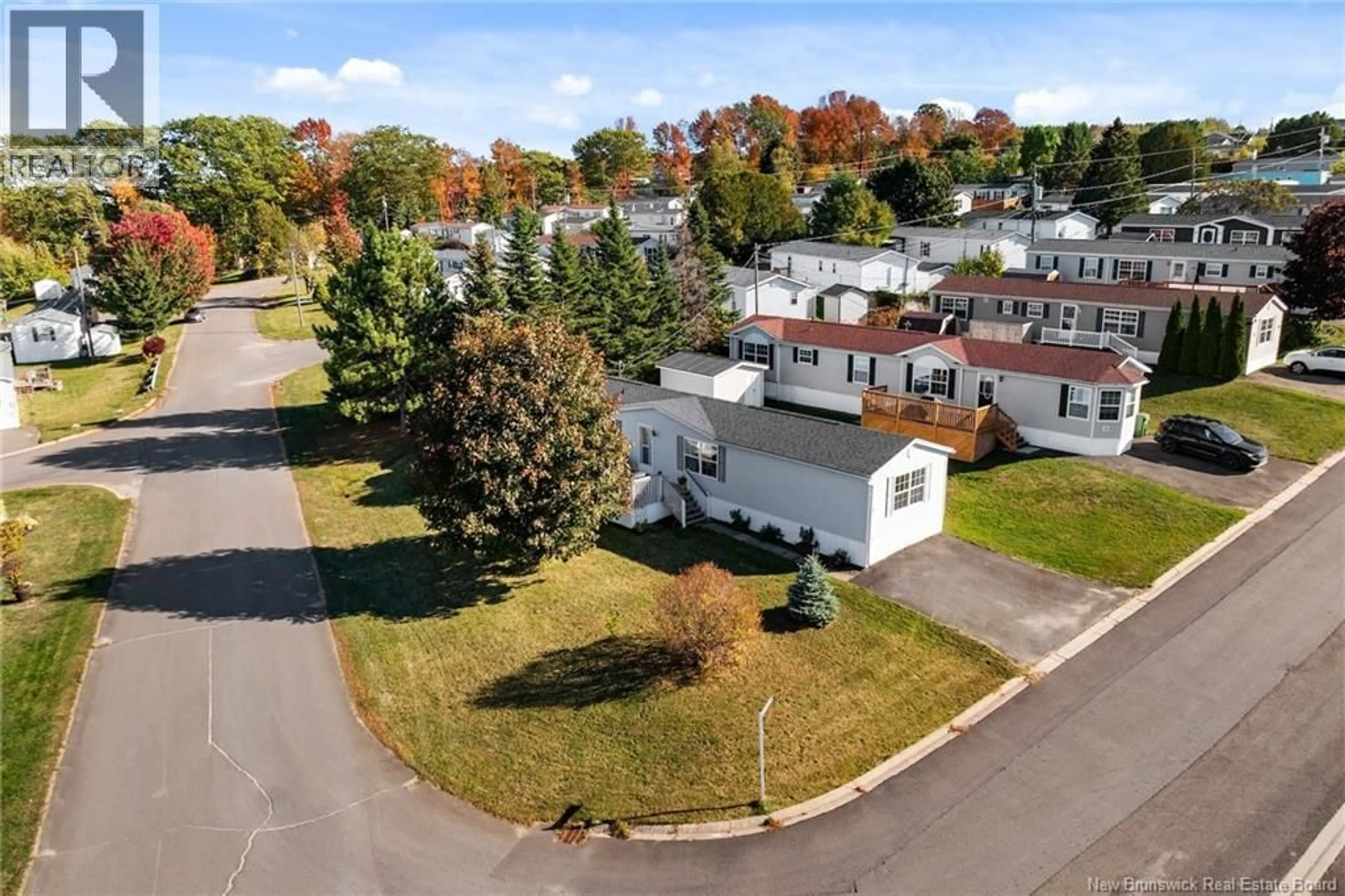 A pic from outside/outdoor area/front of a property/back of a property/a pic from drone, street for 60 SHERRYS LANE, Fredericton New Brunswick E3C1L8
