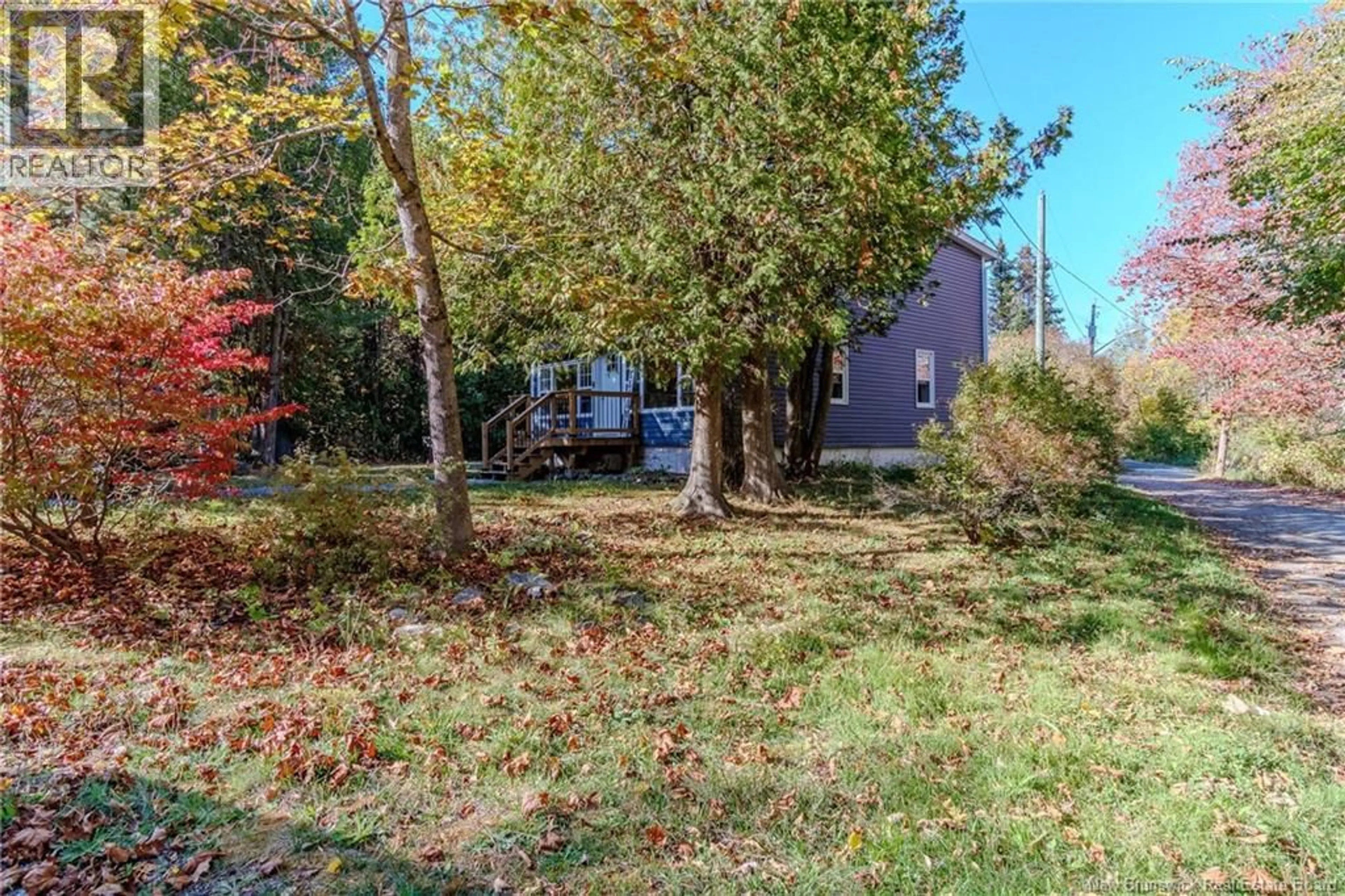 A pic from outside/outdoor area/front of a property/back of a property/a pic from drone, forest/trees view for 45 BELMONT ROAD, Saint John New Brunswick E2M6J9