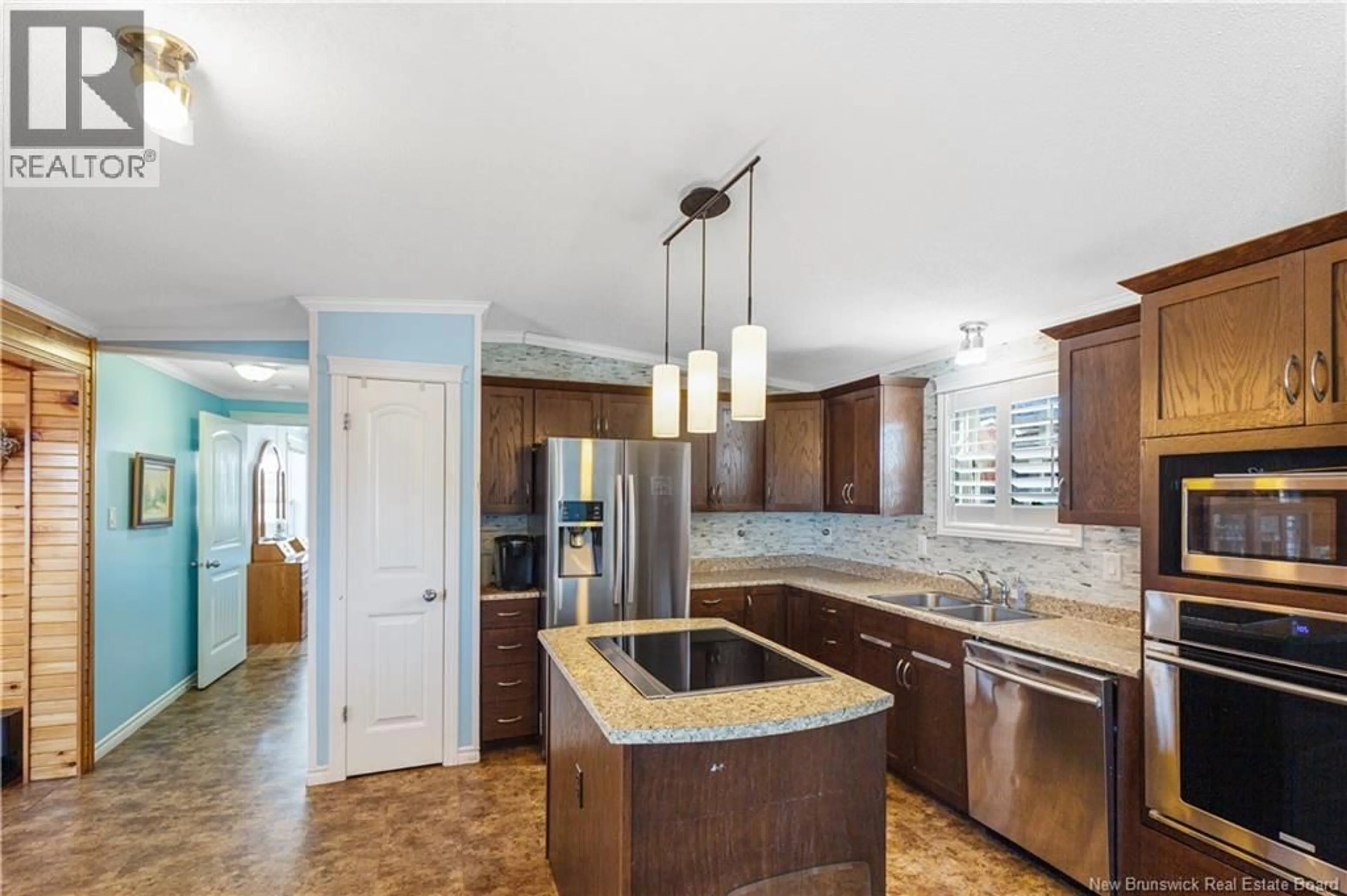 Open concept kitchen, ceramic/tile floor for 40 POLLET LANE, Dieppe New Brunswick E1A9P6