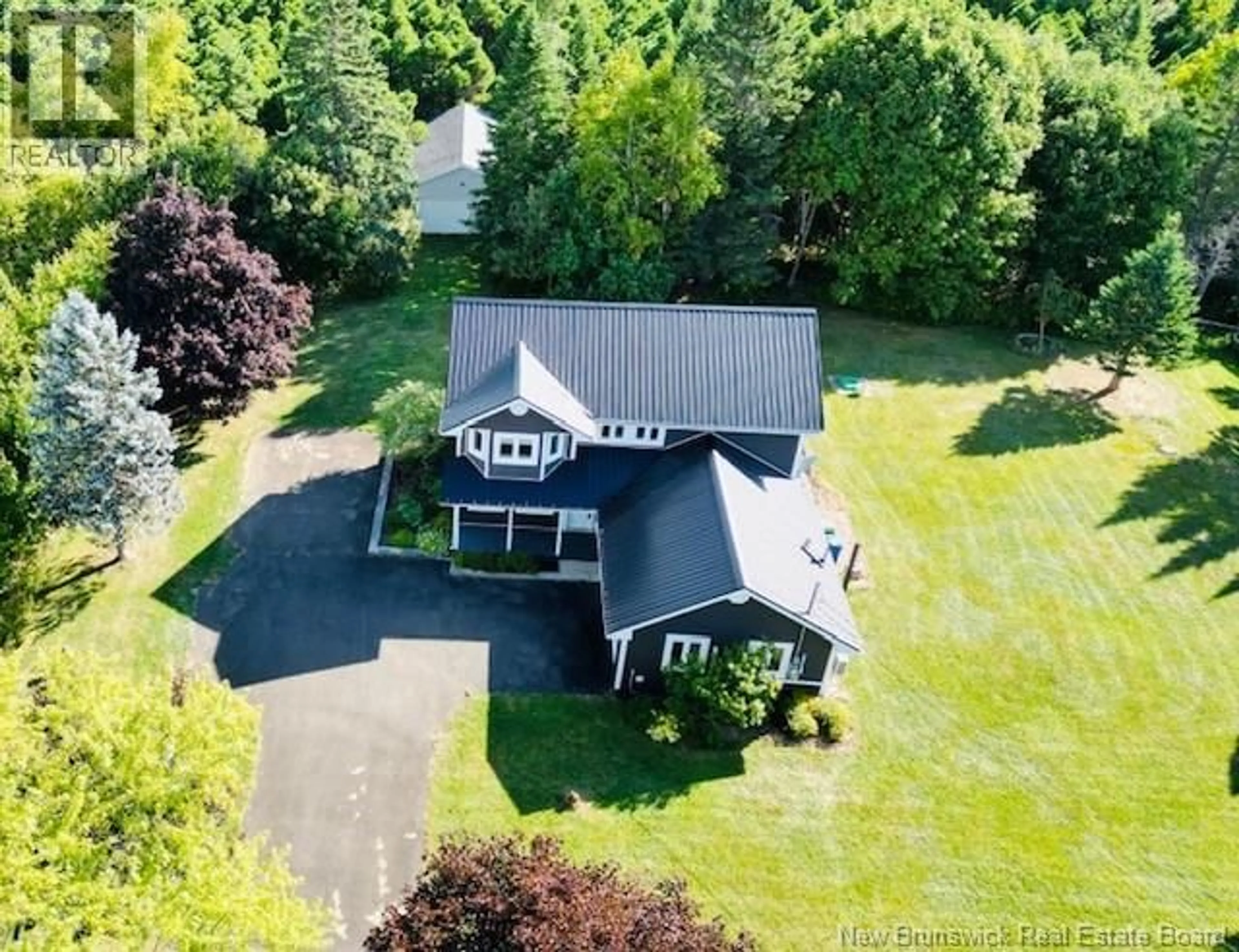 A pic from outside/outdoor area/front of a property/back of a property/a pic from drone, unknown for 40 LEPAGE STREET, Balmoral New Brunswick E8E1J2