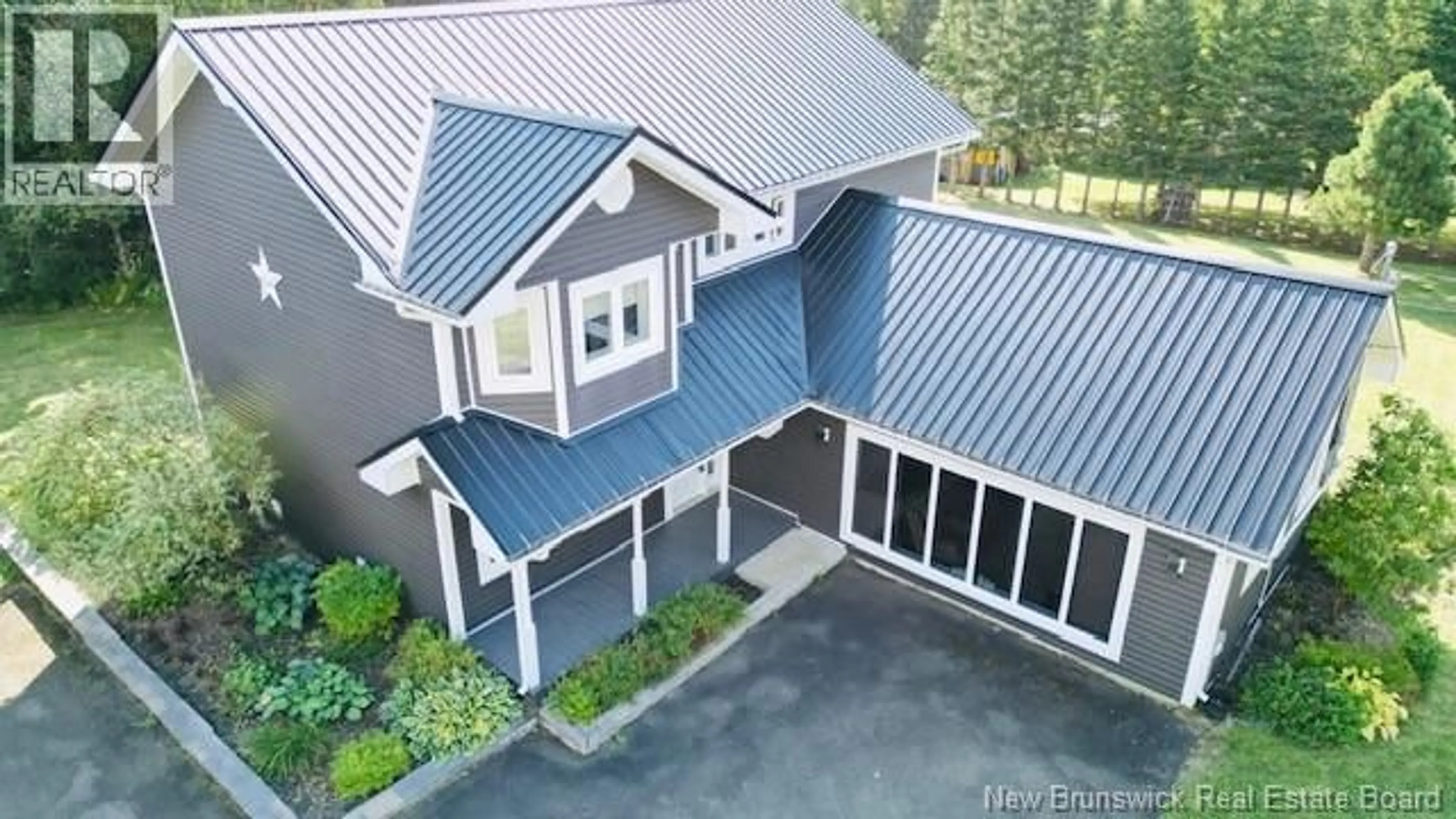 A pic from outside/outdoor area/front of a property/back of a property/a pic from drone, unknown for 40 LEPAGE STREET, Balmoral New Brunswick E8E1J2
