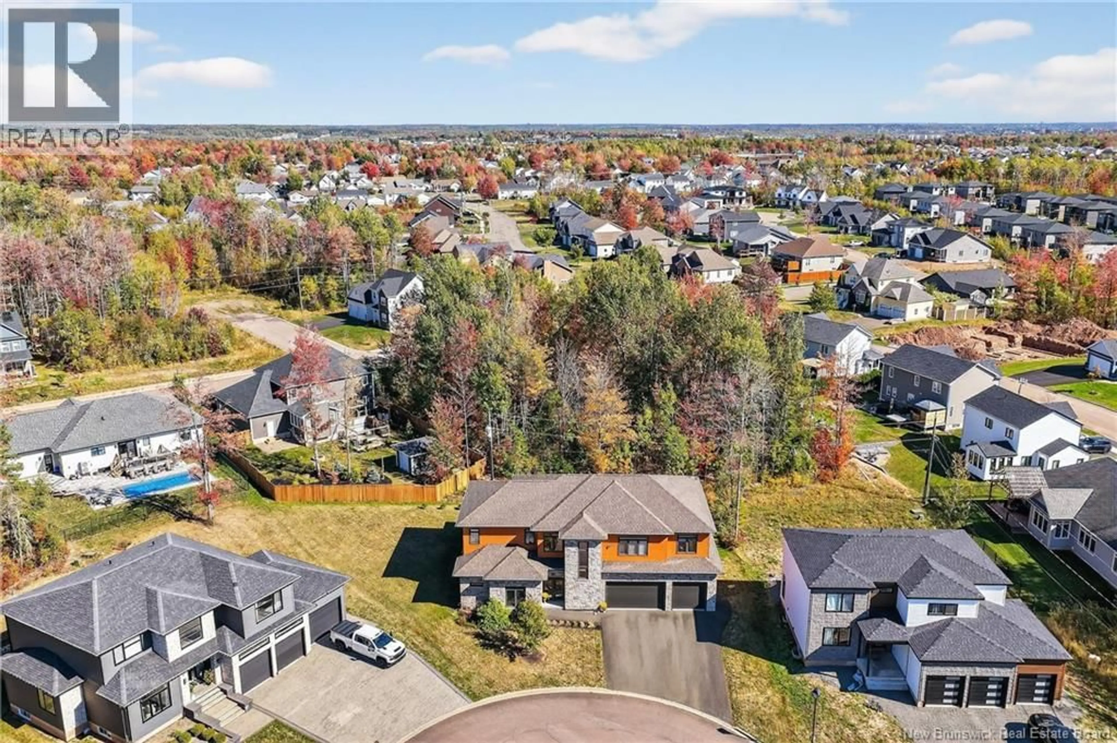 A pic from outside/outdoor area/front of a property/back of a property/a pic from drone, unknown for 15 TURNBERRY COURT, Moncton New Brunswick E1G5R8