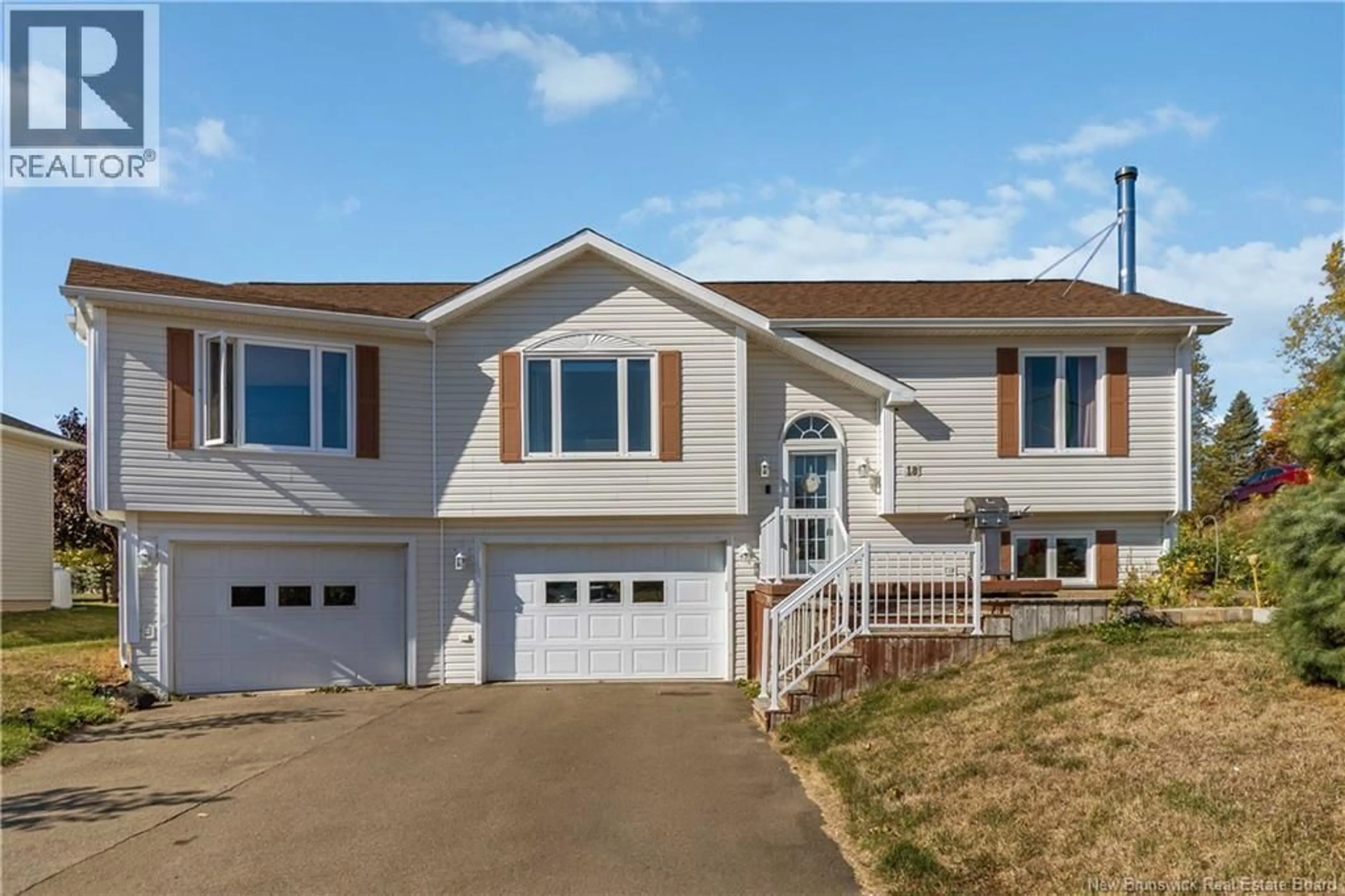 Home with vinyl exterior material, street for 18 HERITAGE, Bouctouche New Brunswick E4S0G1