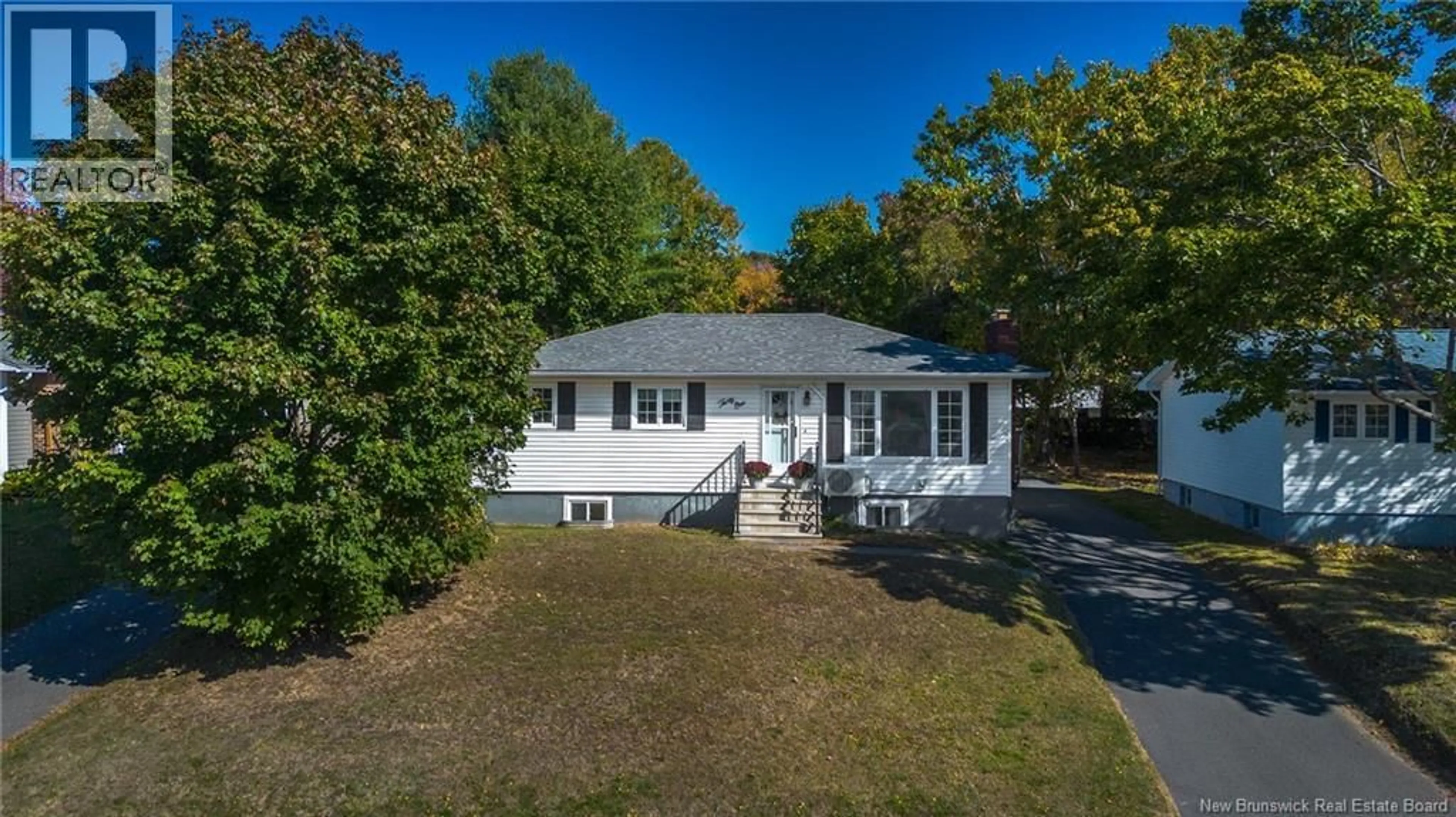 A pic from outside/outdoor area/front of a property/back of a property/a pic from drone, street for 31 FINNAMORE STREET, Oromocto New Brunswick E2V2J9