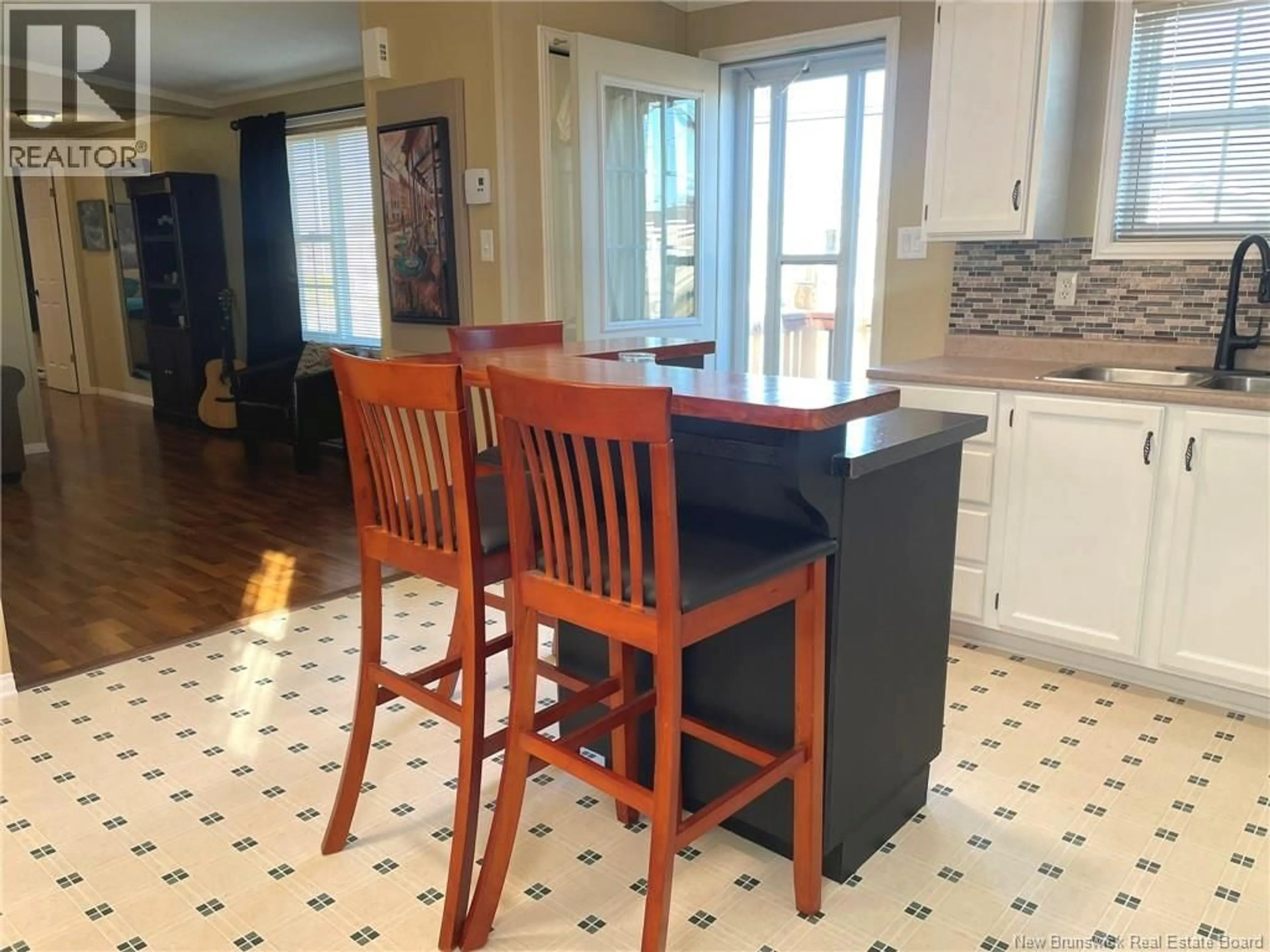 Open concept kitchen, ceramic/tile floor for 51 TRACADIE DRIVE, Dieppe New Brunswick E1A8P3
