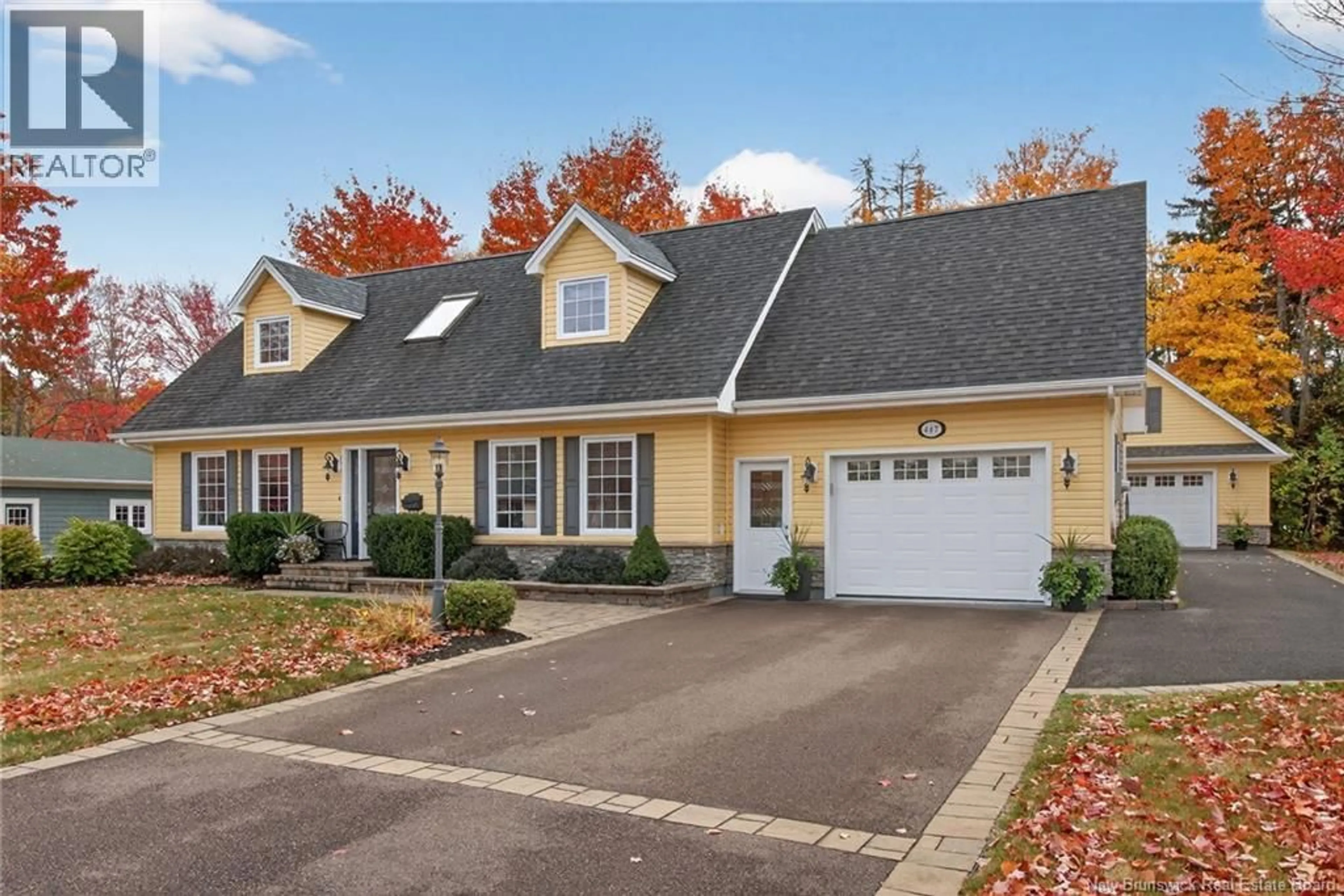 Home with vinyl exterior material, street for 447 BREAUX BRIDGE STREET, Shediac New Brunswick E4P2M5