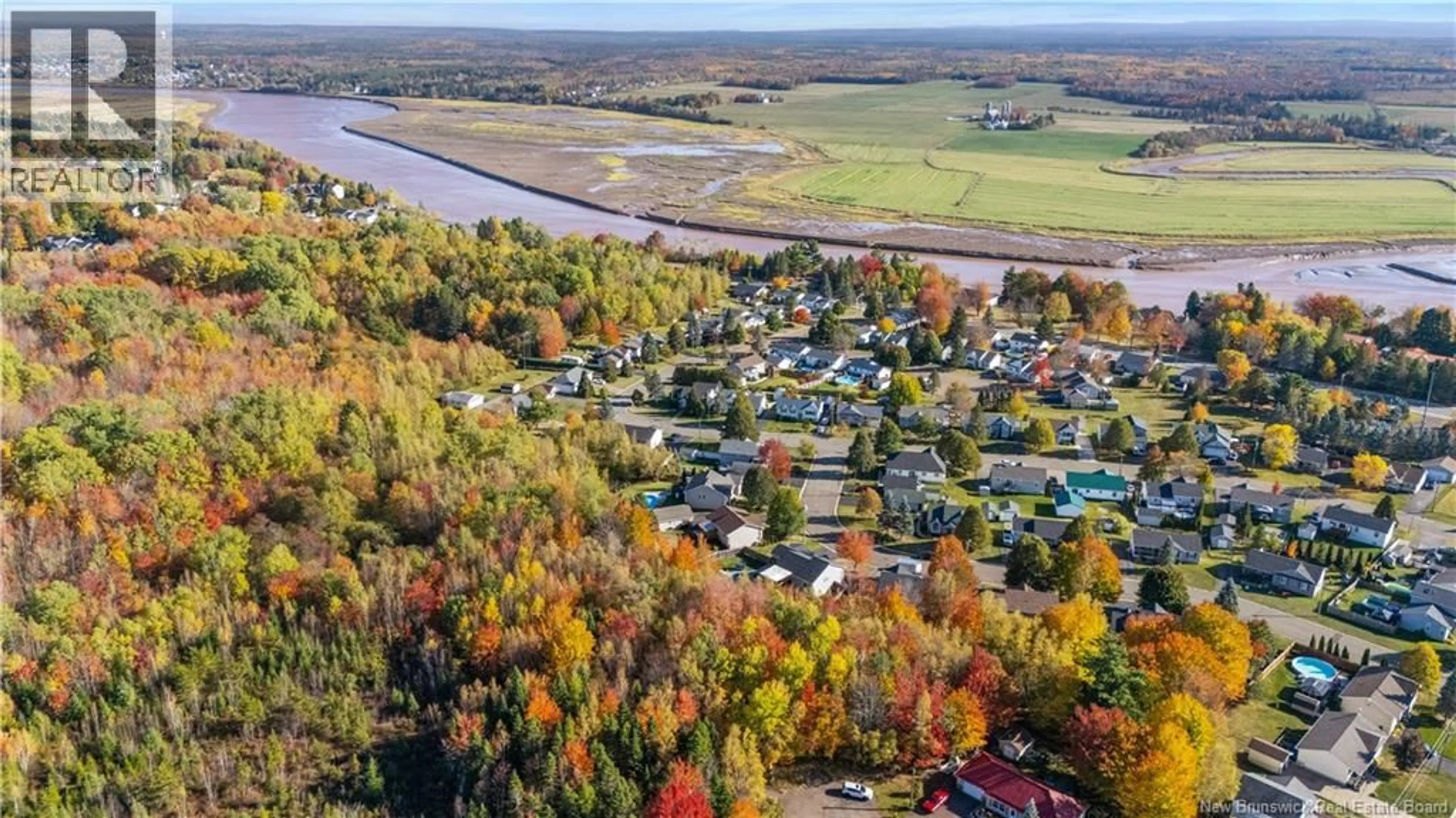A pic from outside/outdoor area/front of a property/back of a property/a pic from drone, water/lake/river/ocean view for 15 TALITH STREET, Allison New Brunswick E1E4V4