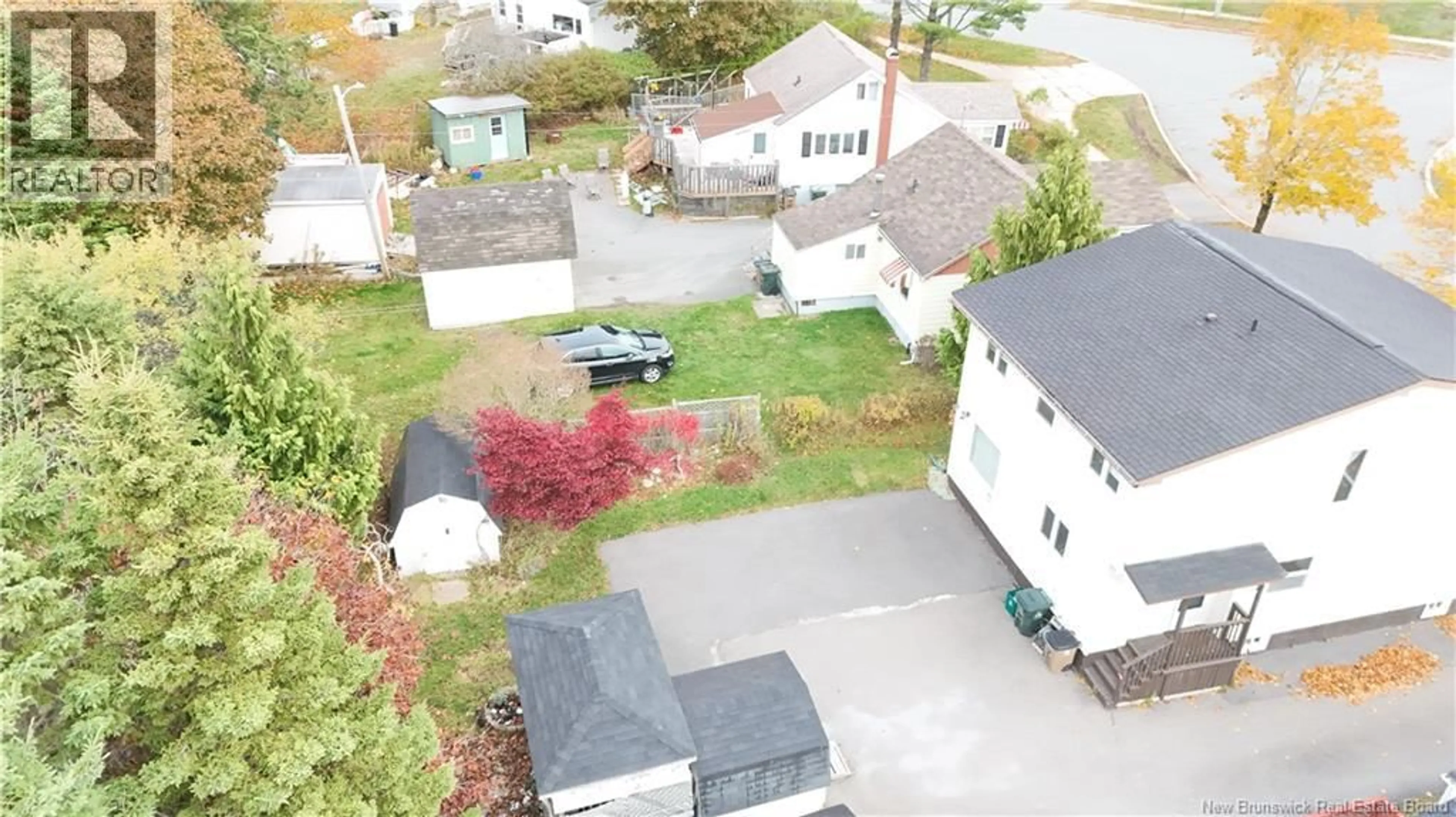 A pic from outside/outdoor area/front of a property/back of a property/a pic from drone, street for 101 BEAVERBROOK AVENUE, Saint John New Brunswick E2K2W8