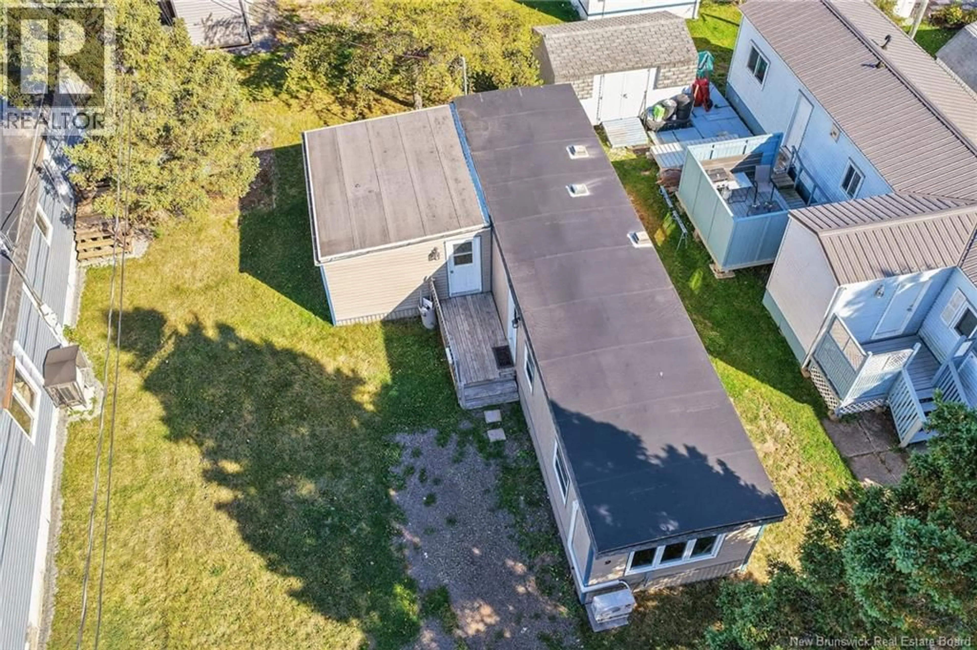 A pic from outside/outdoor area/front of a property/back of a property/a pic from drone, unknown for 9 LAURA LANE, Moncton New Brunswick E1E3S9