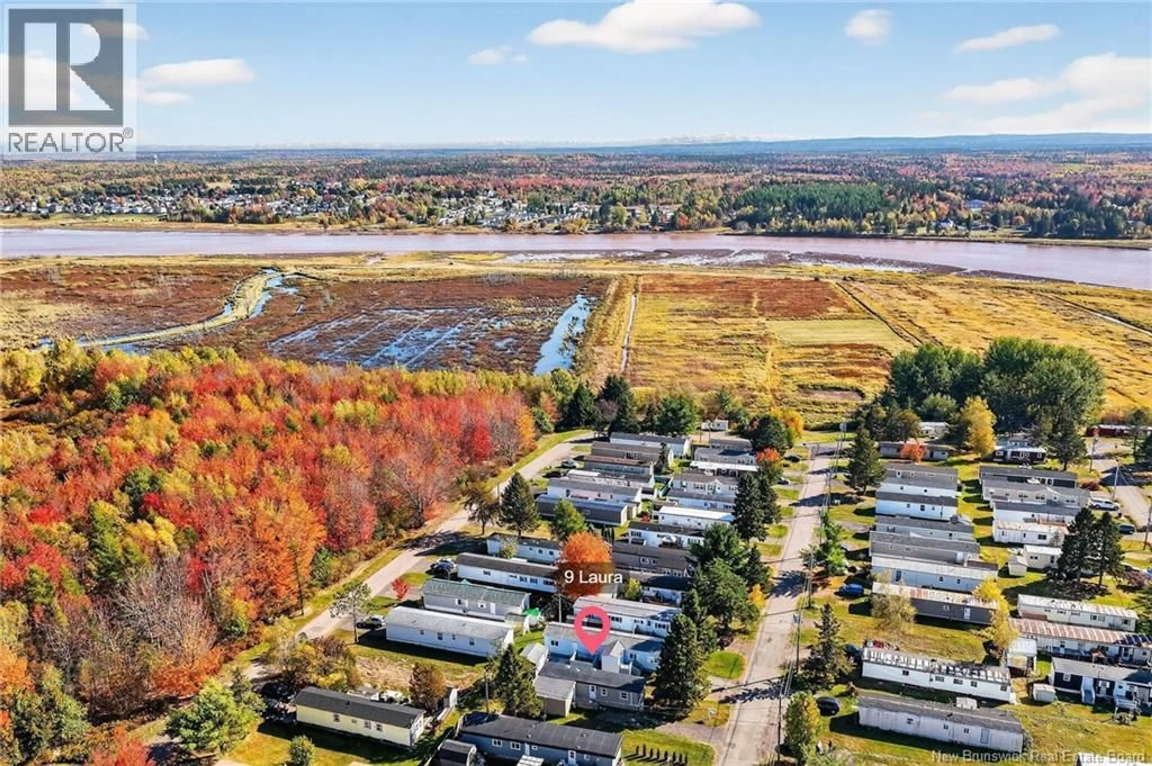 A pic from outside/outdoor area/front of a property/back of a property/a pic from drone, water/lake/river/ocean view for 9 LAURA LANE, Moncton New Brunswick E1E3S9