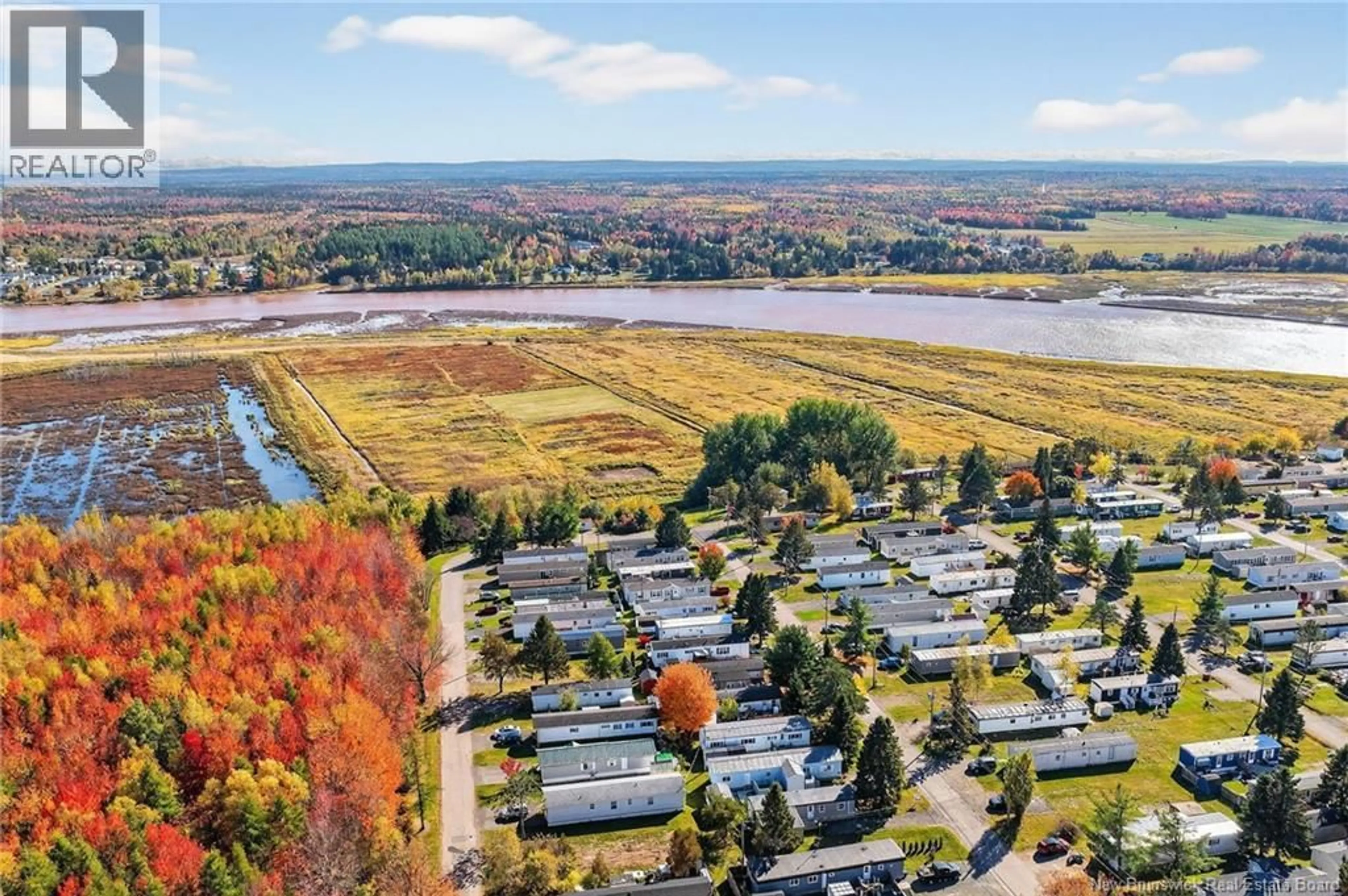 A pic from outside/outdoor area/front of a property/back of a property/a pic from drone, water/lake/river/ocean view for 9 LAURA LANE, Moncton New Brunswick E1E3S9