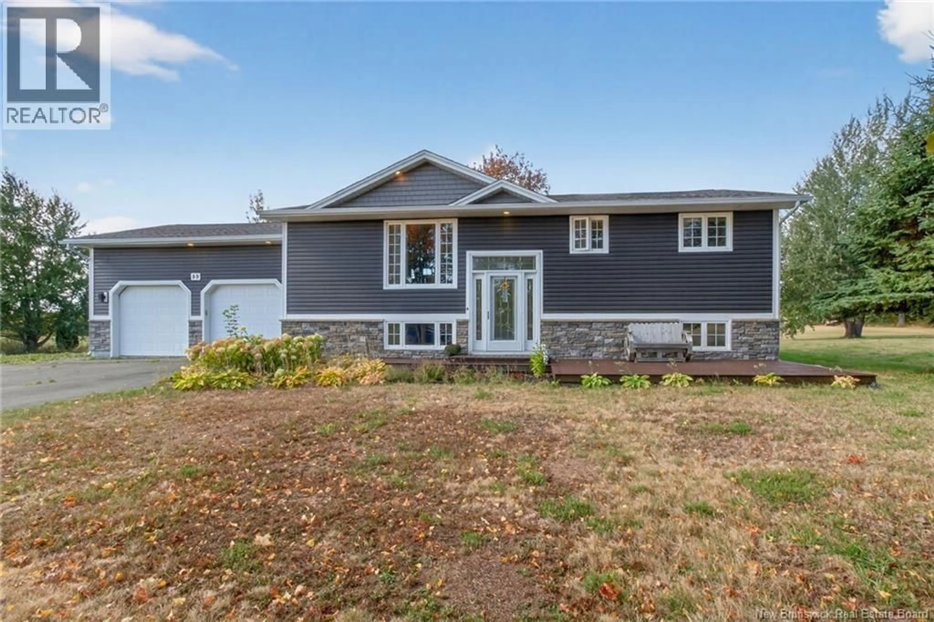 Home with vinyl exterior material, street for 55 DES ROCHES, Bouctouche Bay New Brunswick E4S4L9
