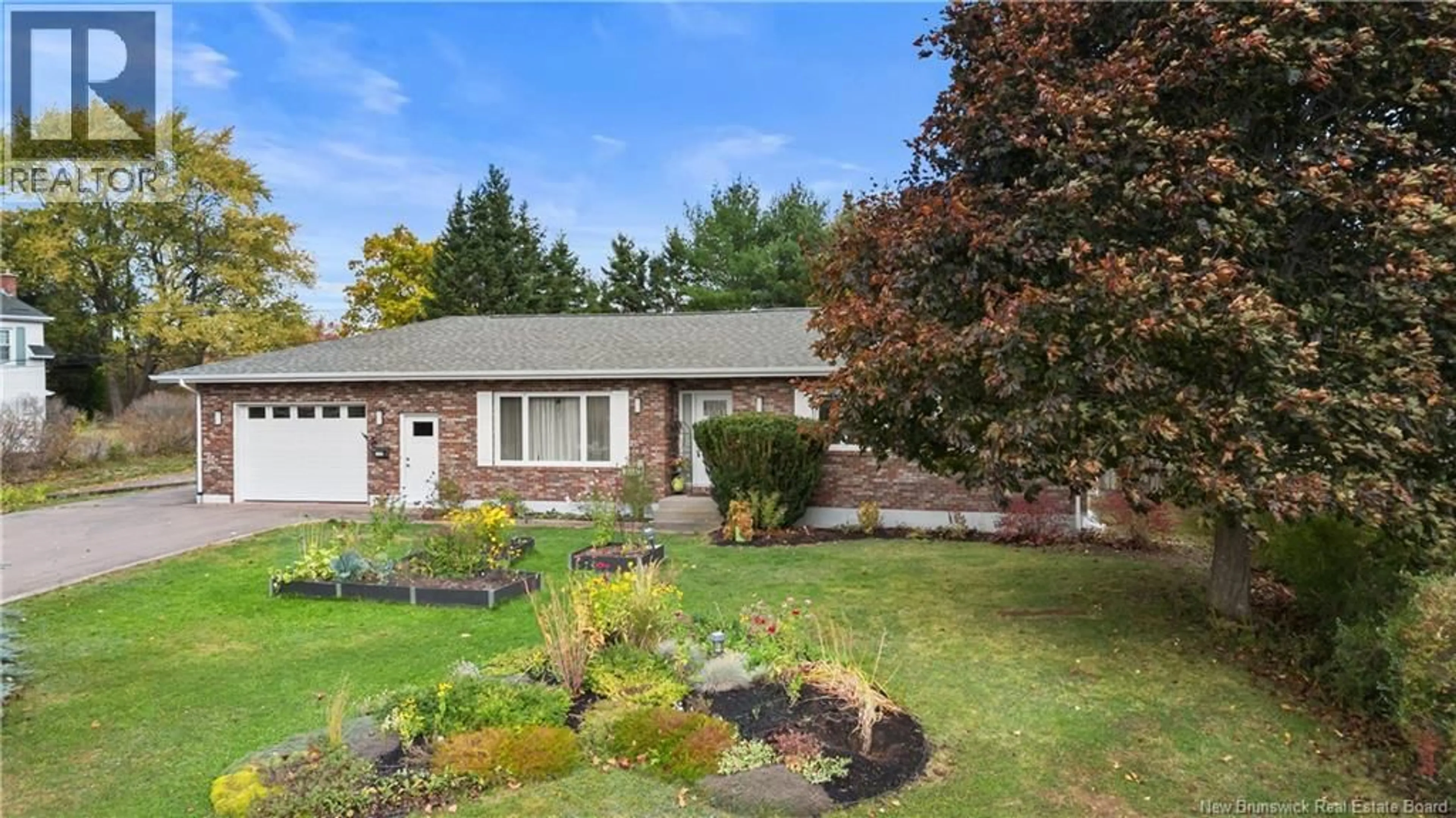 Home with vinyl exterior material, street for 1250 AMIRAULT STREET, Dieppe New Brunswick E1A1E2