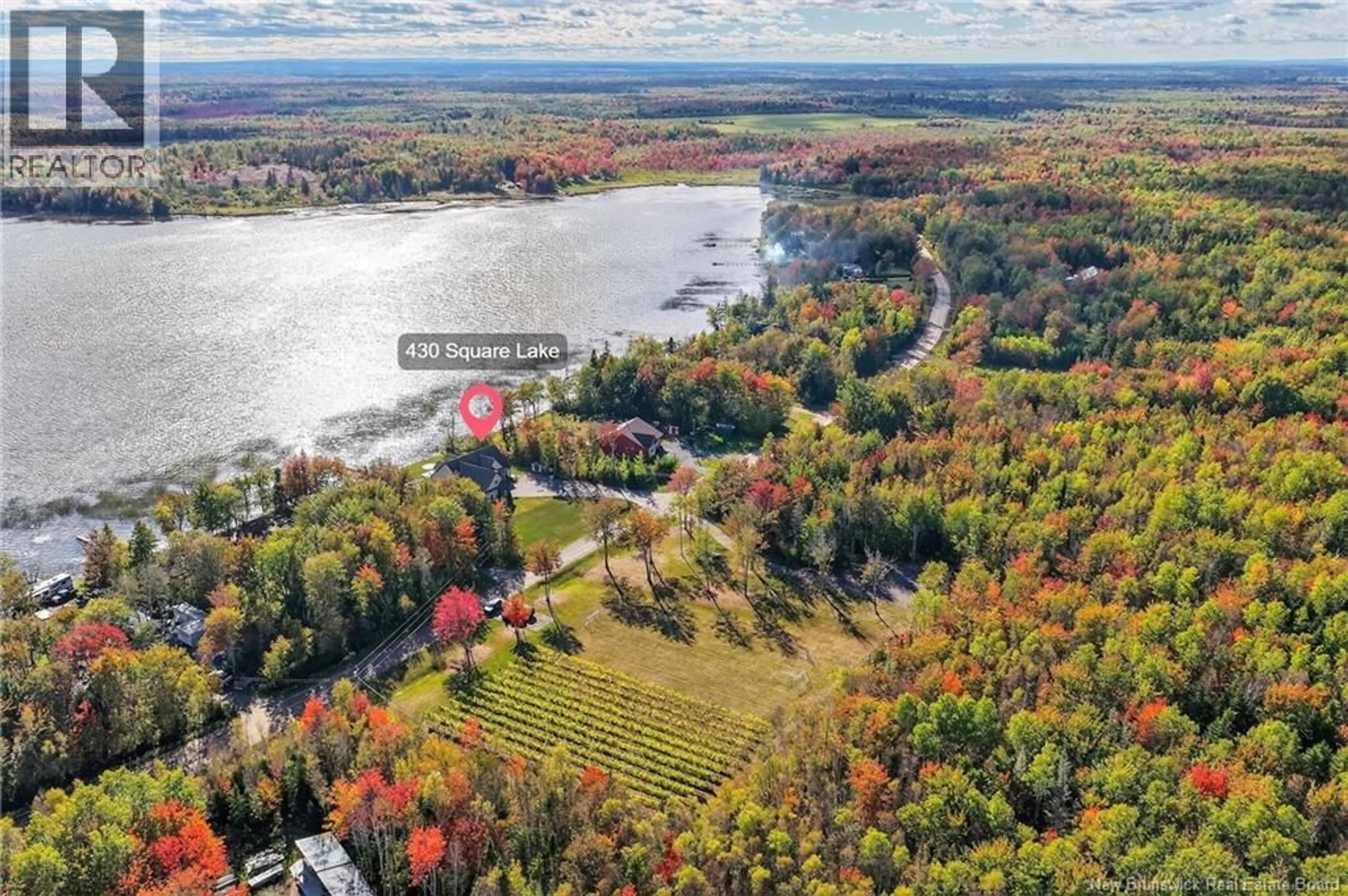 A pic from outside/outdoor area/front of a property/back of a property/a pic from drone, water/lake/river/ocean view for 430 SQUARE LAKE, Saint-Andre-LeBlanc New Brunswick E4P6G8