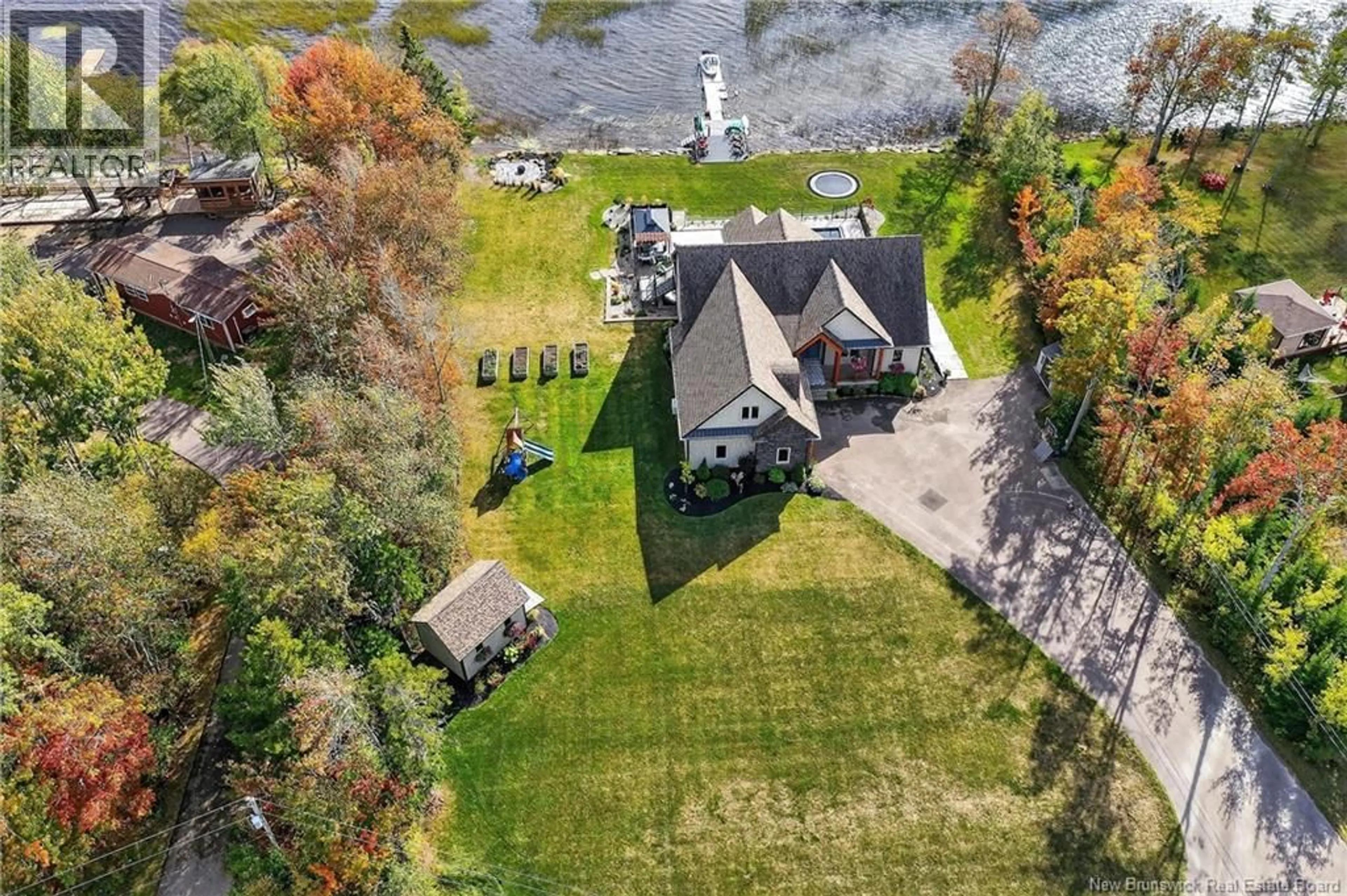 A pic from outside/outdoor area/front of a property/back of a property/a pic from drone, water/lake/river/ocean view for 430 SQUARE LAKE, Saint-Andre-LeBlanc New Brunswick E4P6G8