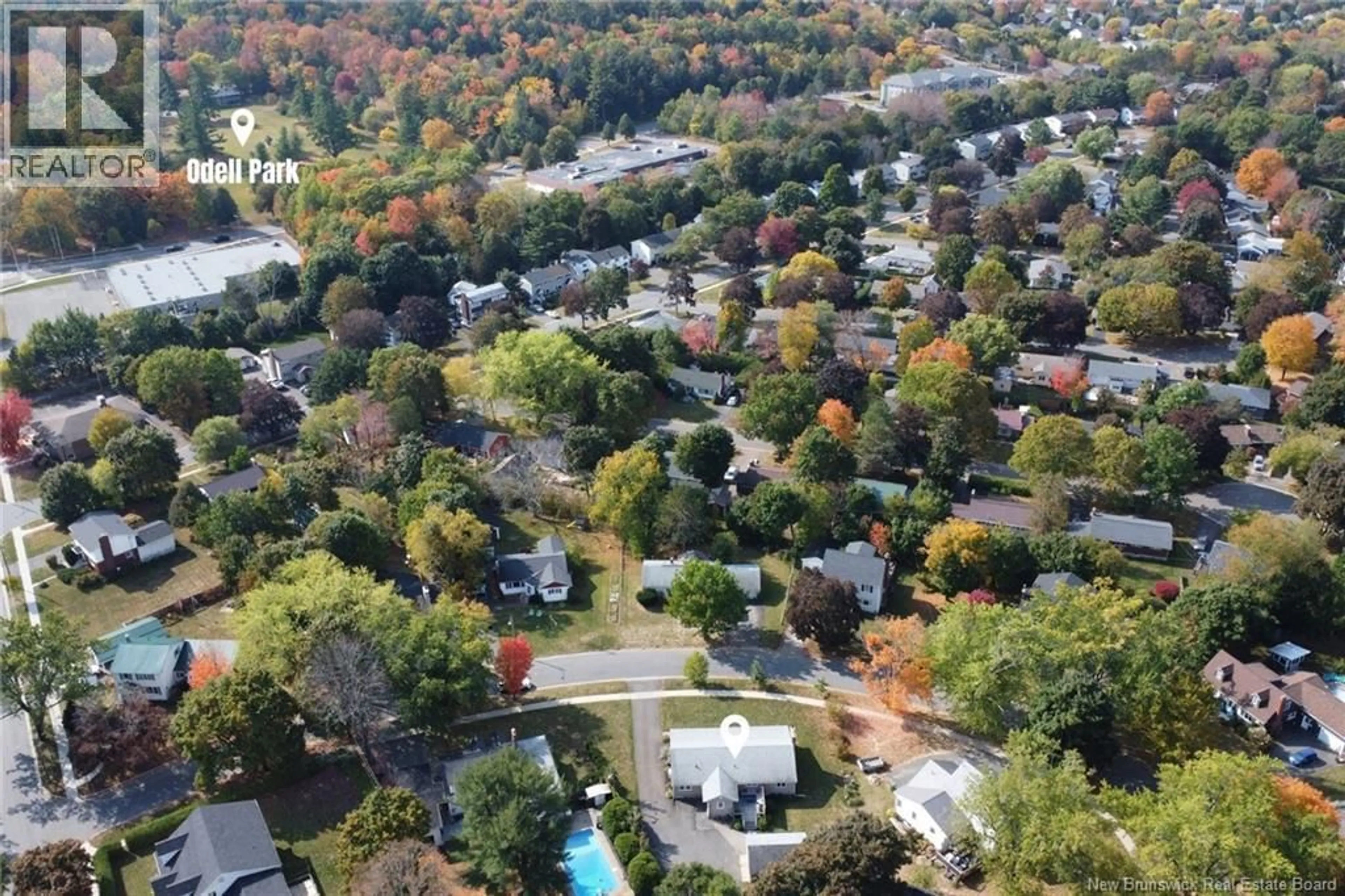 A pic from outside/outdoor area/front of a property/back of a property/a pic from drone, unknown for 22 WOODFIELD CRESCENT, Fredericton New Brunswick E3B2N1