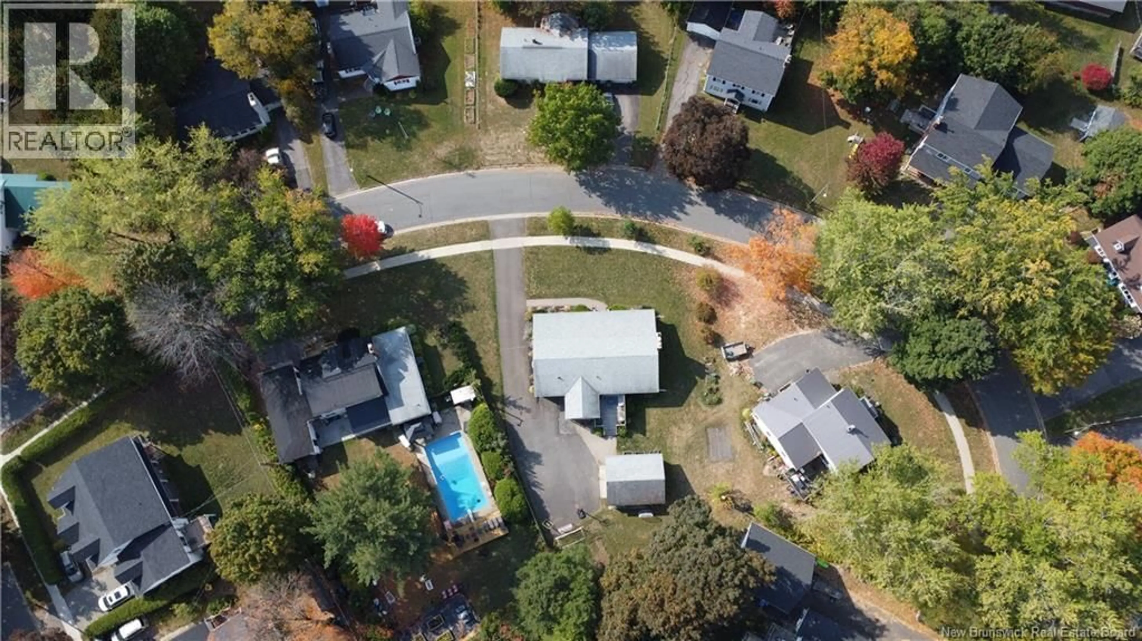 A pic from outside/outdoor area/front of a property/back of a property/a pic from drone, street for 22 WOODFIELD CRESCENT, Fredericton New Brunswick E3B2N1