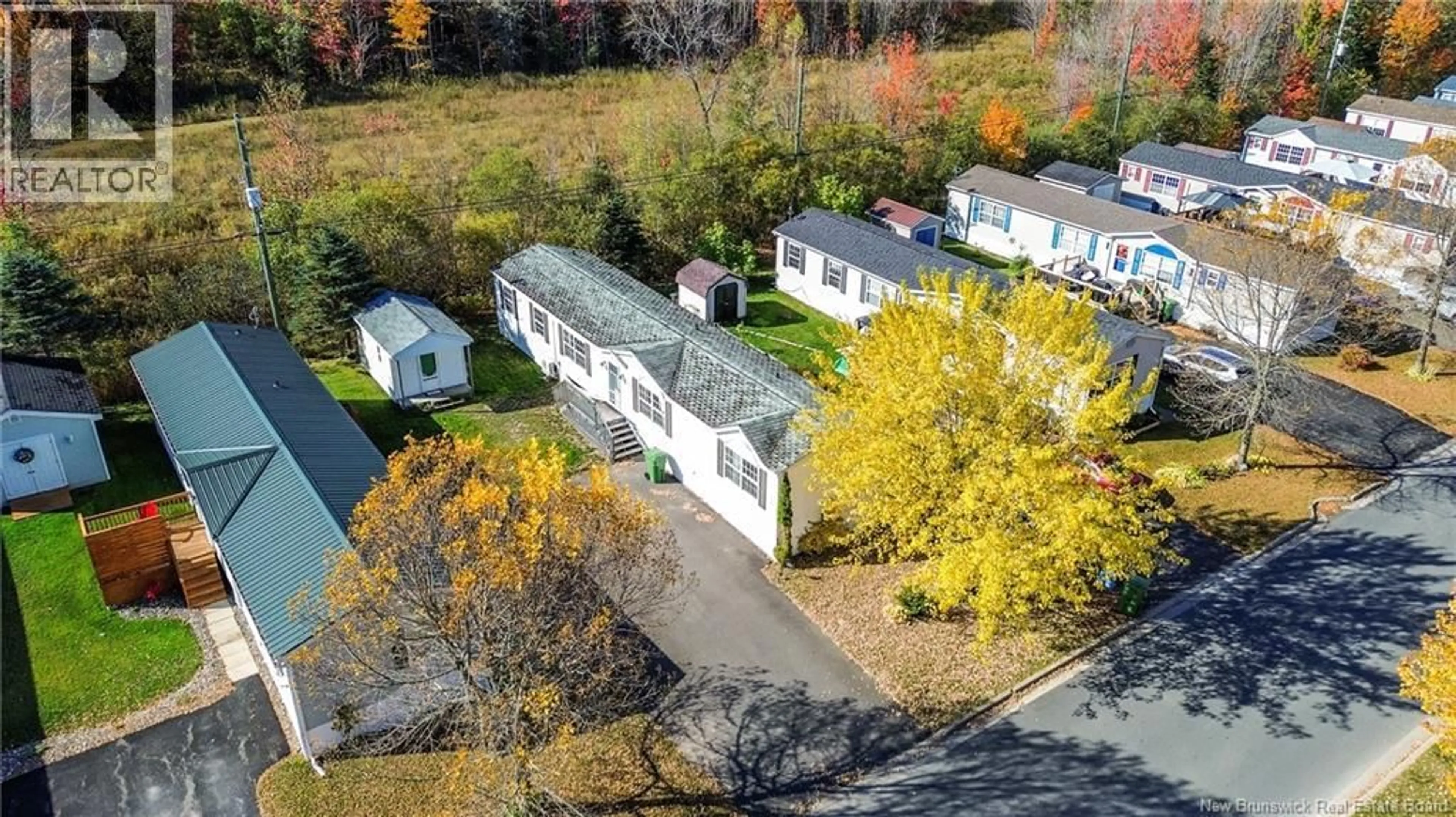 A pic from outside/outdoor area/front of a property/back of a property/a pic from drone, street for 44 JACOB STREET, Fredericton New Brunswick E3G0E1