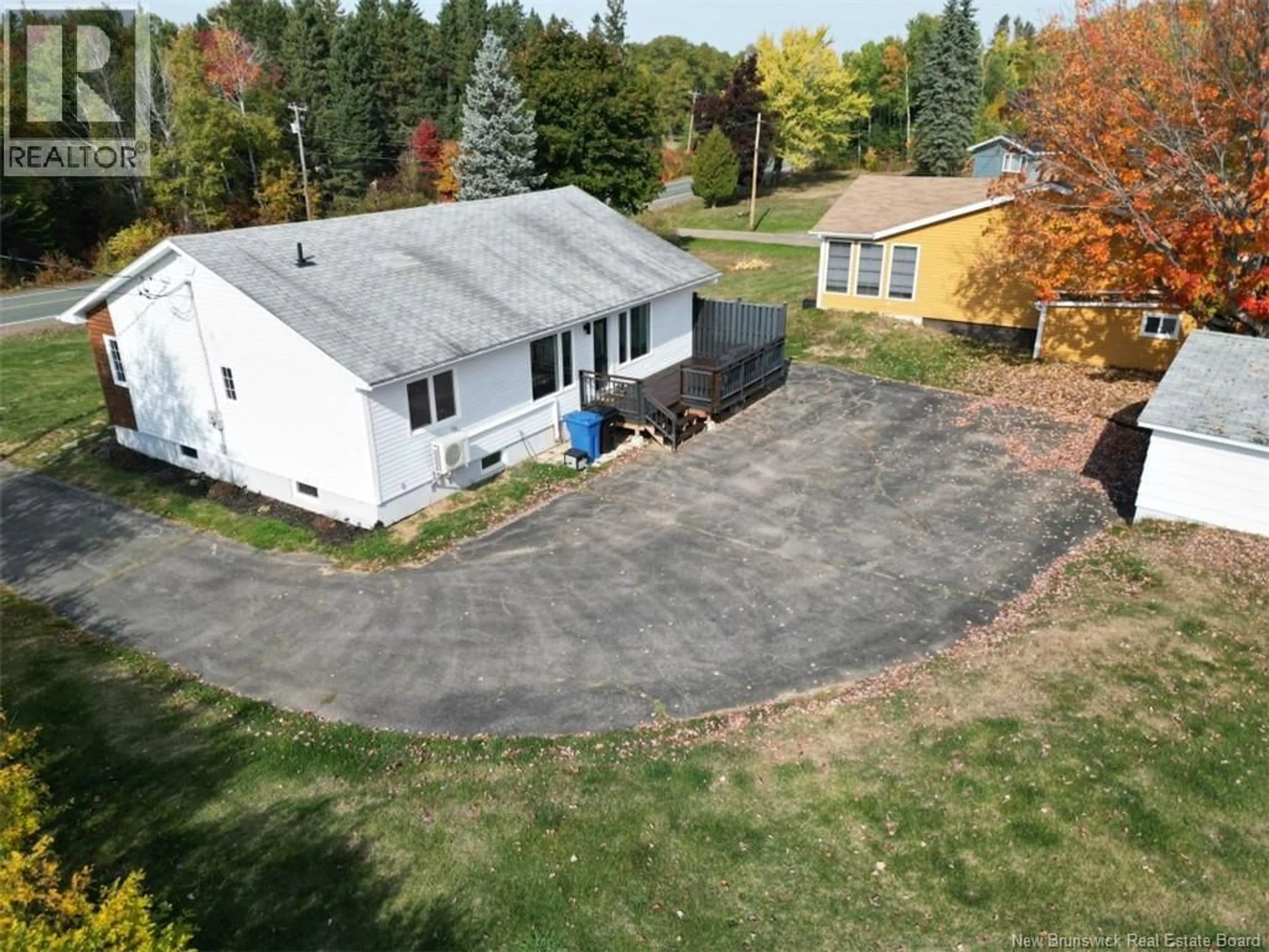 A pic from outside/outdoor area/front of a property/back of a property/a pic from drone, street for 1990 CARRON, Bathurst New Brunswick E2A5Z8