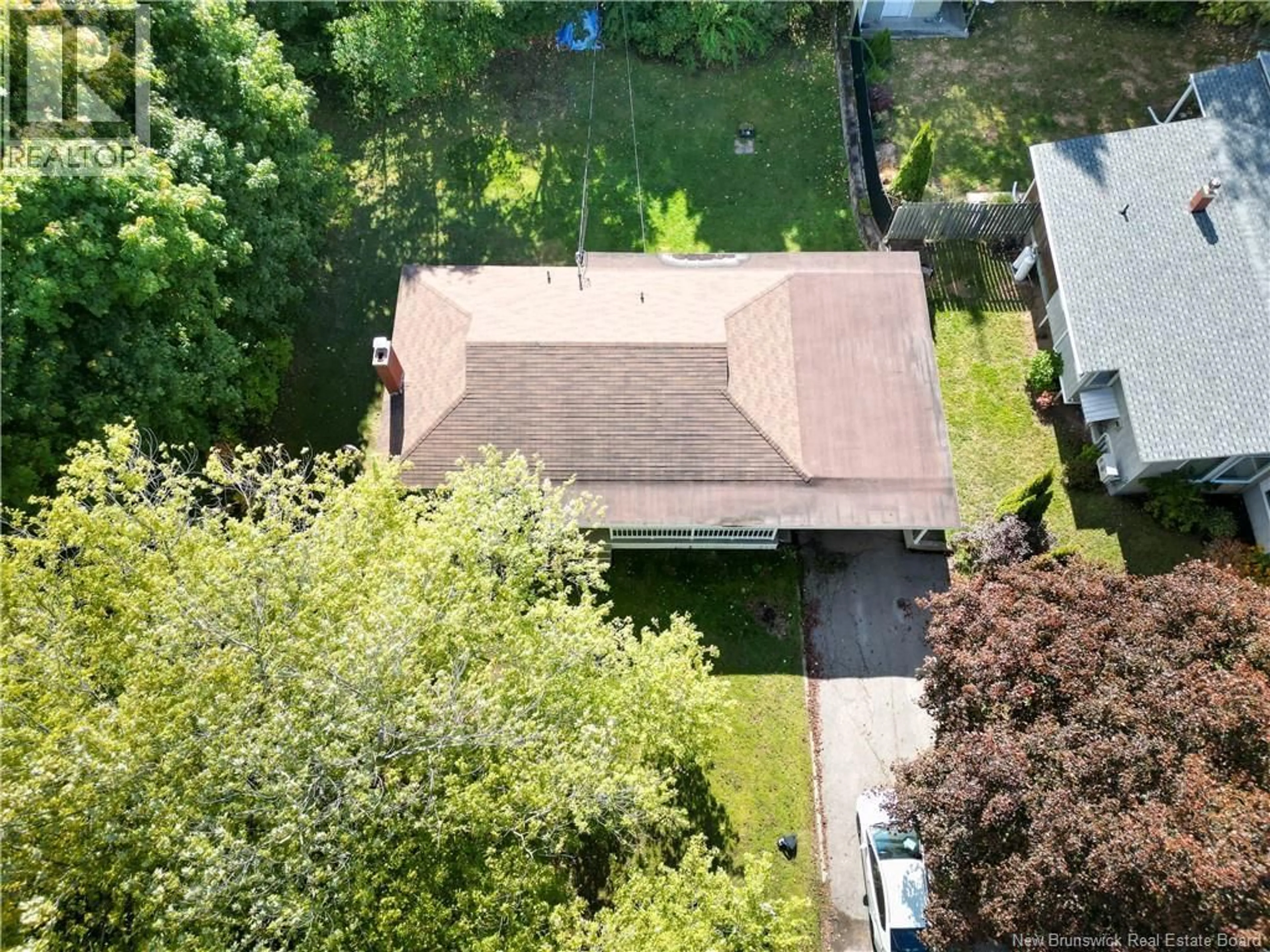 A pic from outside/outdoor area/front of a property/back of a property/a pic from drone, unknown for 30 CANTERBURY DRIVE, Fredericton New Brunswick E3B4L6